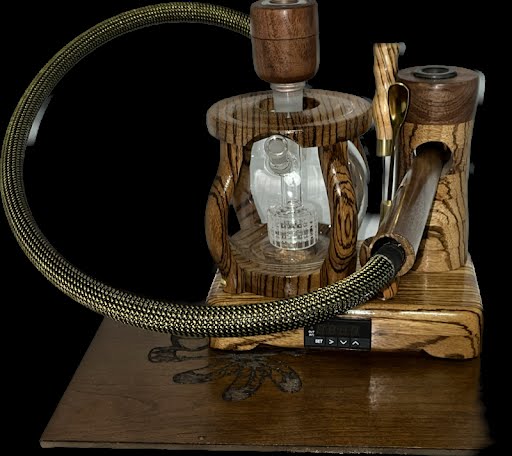 Made in a small family shop in the Southeast United States, each system is unique. This is a true conversation piece of functional art! Each set may contain different parts and of course will offer an individual mixture of woods and beauty only nature can provide.
This particular set includes:
24” whip and 12” wooden mouthpiece with Integrated Orb V2 Bracket System
Integrated PID Controller with US Standard Five Pin XLR Connection w/included Injector Stand
BN-LINK App C Controlled Smart WiFi Outlet Timer