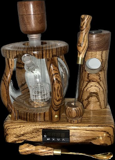 Made in a small family shop in the Southeast United States, each system is unique. This is a true conversation piece of functional art! Each set may contain different parts and of course will offer an individual mixture of woods and beauty only nature can provide.
This particular set includes:
24” whip and 12” wooden mouthpiece with Integrated Orb V2 Bracket System
Integrated PID Controller with US Standard Five Pin XLR Connection w/included Injector Stand
BN-LINK App C Controlled Smart WiFi Outlet Timer