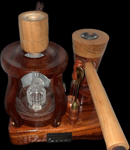 Made in a small family shop in the Southeast United States, each system is unique. This is a true conversation piece of functional art! Each set may contain different parts and of course will offer an individual mixture of woods and beauty only nature can provide.
This particular set includes:
24” whip and 12” wooden mouthpiece with Integrated Orb V2 Bracket System
Integrated PID Controller with US Standard Five Pin XLR Connection w/included Injector Stand
BN-LINK App C Controlled Smart WiFi Outlet Timer