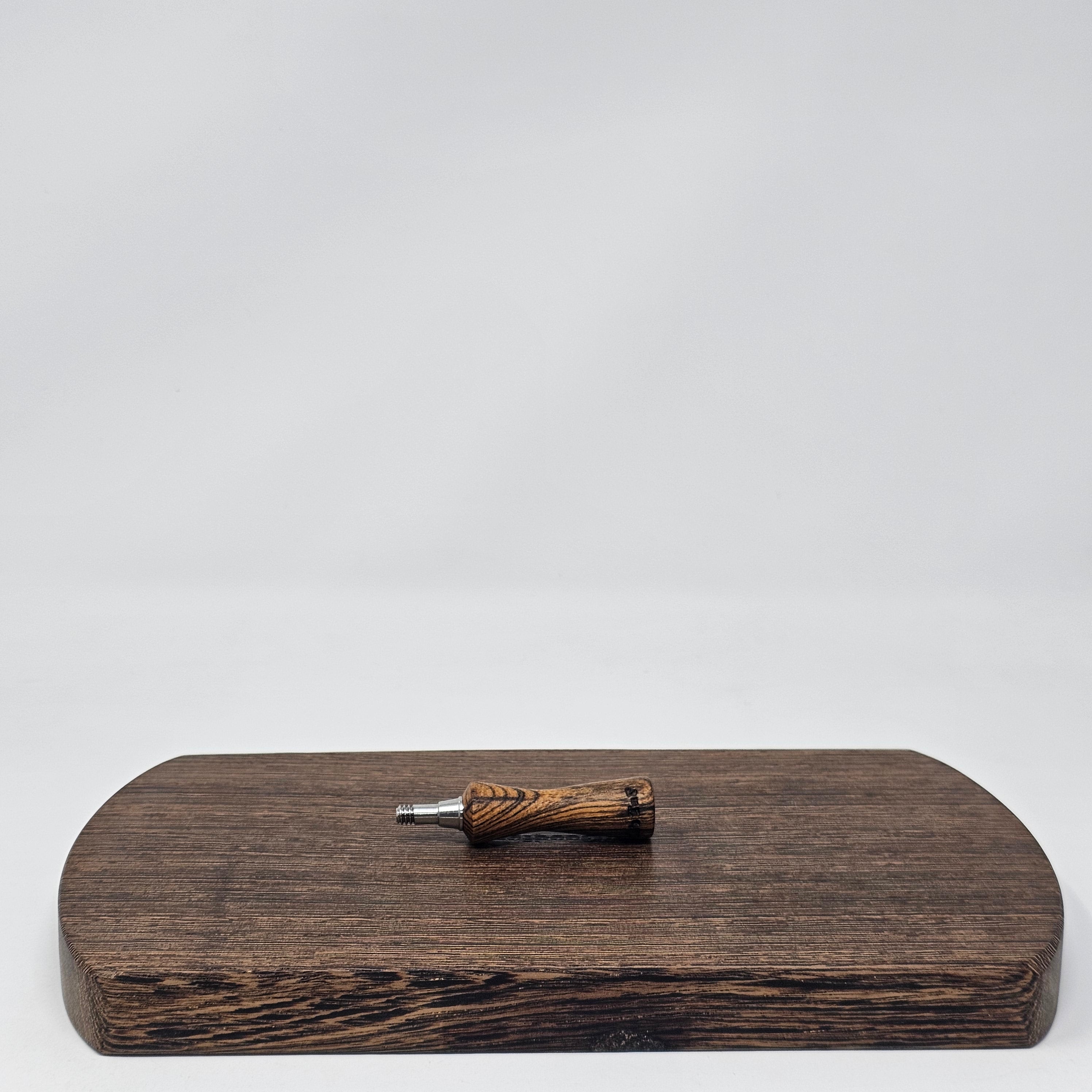Wood handles crafted by hand in Mississippi!
These are sold as subassemblies as added an adjustment screw and a collar to make the parts interchangeable.
This handle has been tested on the Matrix Injector Bowl (CT 7), but has the same screw thread as the Shovelhead bowl and Matrix Bowl so it should work there as well. Same with all bowls from the O'Connell Collection.