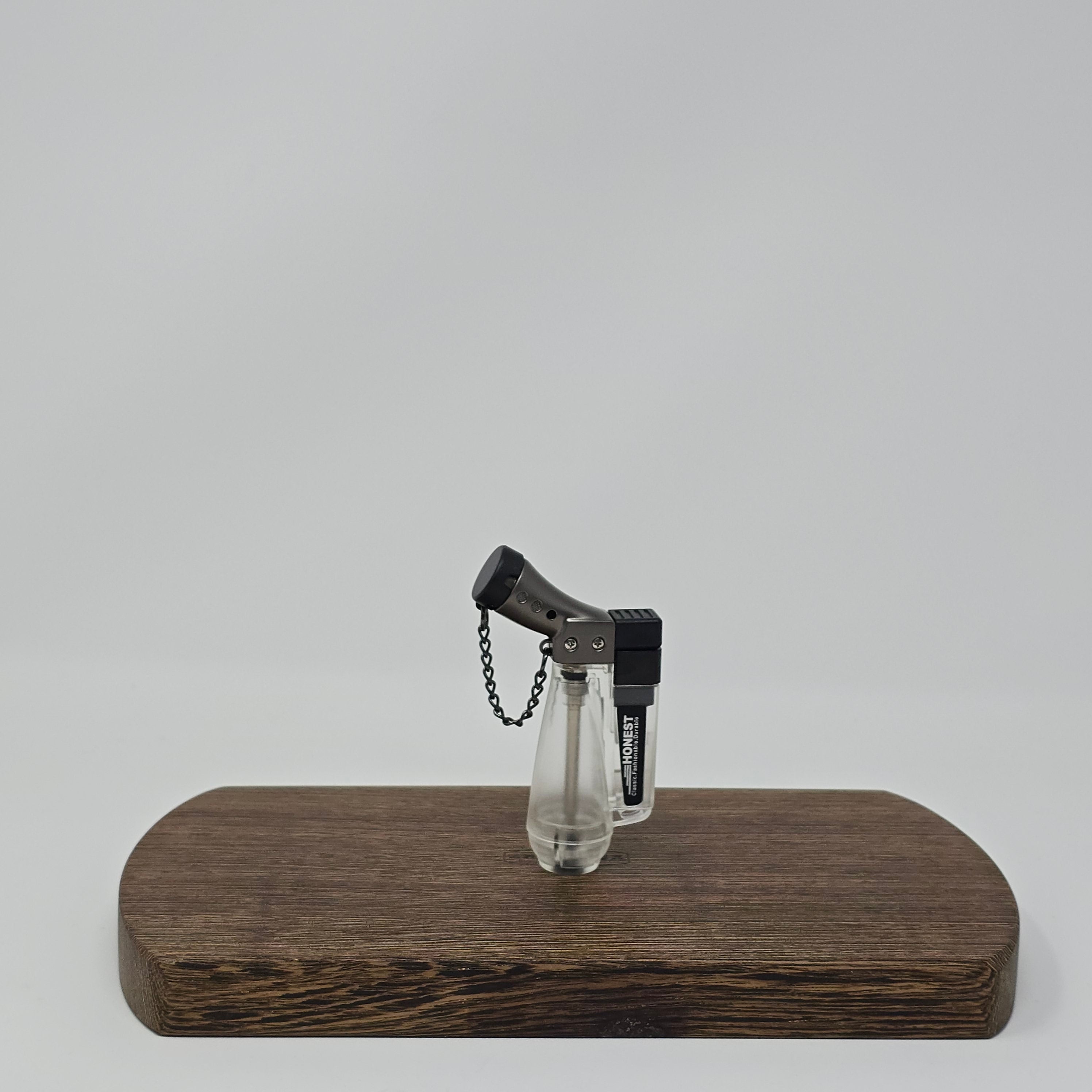 New Official Inhale (Vapman/Lotus) Torch.
The Vapman Jet Lighter serves as the perfect energy companion, boasting a generously-sized transparent tank that eliminates the need for frequent refills, providing a sense of freedom and autonomy. Its optimal angle and exceptional manufacturing quality make it one of the market's best jet lighters, ensuring an ideal pairing with your butane vaporizer.
Sorry can’t be shipped internationally.