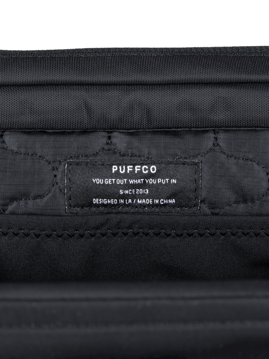 Travel storage bag
Made for the Puffco Proxy Vaporizer
Quick-access loading tray
Storage for jars, a battery pack, swabs, Hot Knife, Travel Pipe, and more!
Symmetrical design
8 Pockets + hidden compartment
Durable 300d ripstop nylon
Quilted padding to protect gear
Adjustable shoulder strap
Zippered closure
Multiple color options available
Available in Black and Desert colorways.