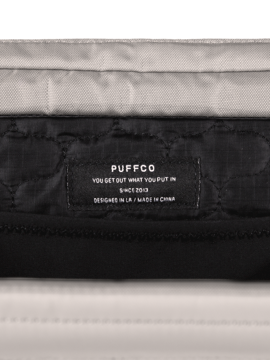 Travel storage bag
Made for the Puffco Proxy Vaporizer
Quick-access loading tray
Storage for jars, a battery pack, swabs, Hot Knife, Travel Pipe, and more!
Symmetrical design
8 Pockets + hidden compartment
Durable 300d ripstop nylon
Quilted padding to protect gear
Adjustable shoulder strap
Zippered closure
Multiple color options available
Available in Black and Desert colorways.
