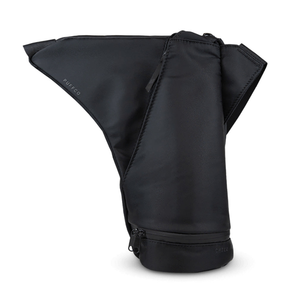 It's not about the destination. The Puffco Journey Bag keeps everything you need organized and accessible when you’re on-the-go. This eye-catching, durable bag has multiple zippered pockets, a long, adjustable strap for one shoulder or cross-body wear, and a magnetic buckle.
Features:
- Peak & Peak Pro pocket
- Cold storage with freezer pack included
- Large central storage pocket
- Internal pouch for Hot Knife
- Screen safe phone pocket lined with microfiber