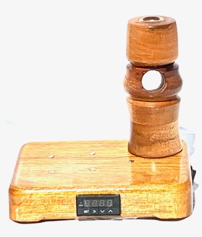 Made in a small family shop in the Southeast United States, each system is unique. This is a true conversation piece of functional art! Each set may contain different parts and of course will offer an individual mixture of woods and beauty only nature can provide.
This particular set includes:
24” whip and 12” wooden mouthpiece with Integrated Orb V2 Bracket System
Integrated PID Controller with US Standard Five Pin XLR Connection w/included Injector Stand
BN-LINK App C Controlled Smart WiFi Outlet Timer
