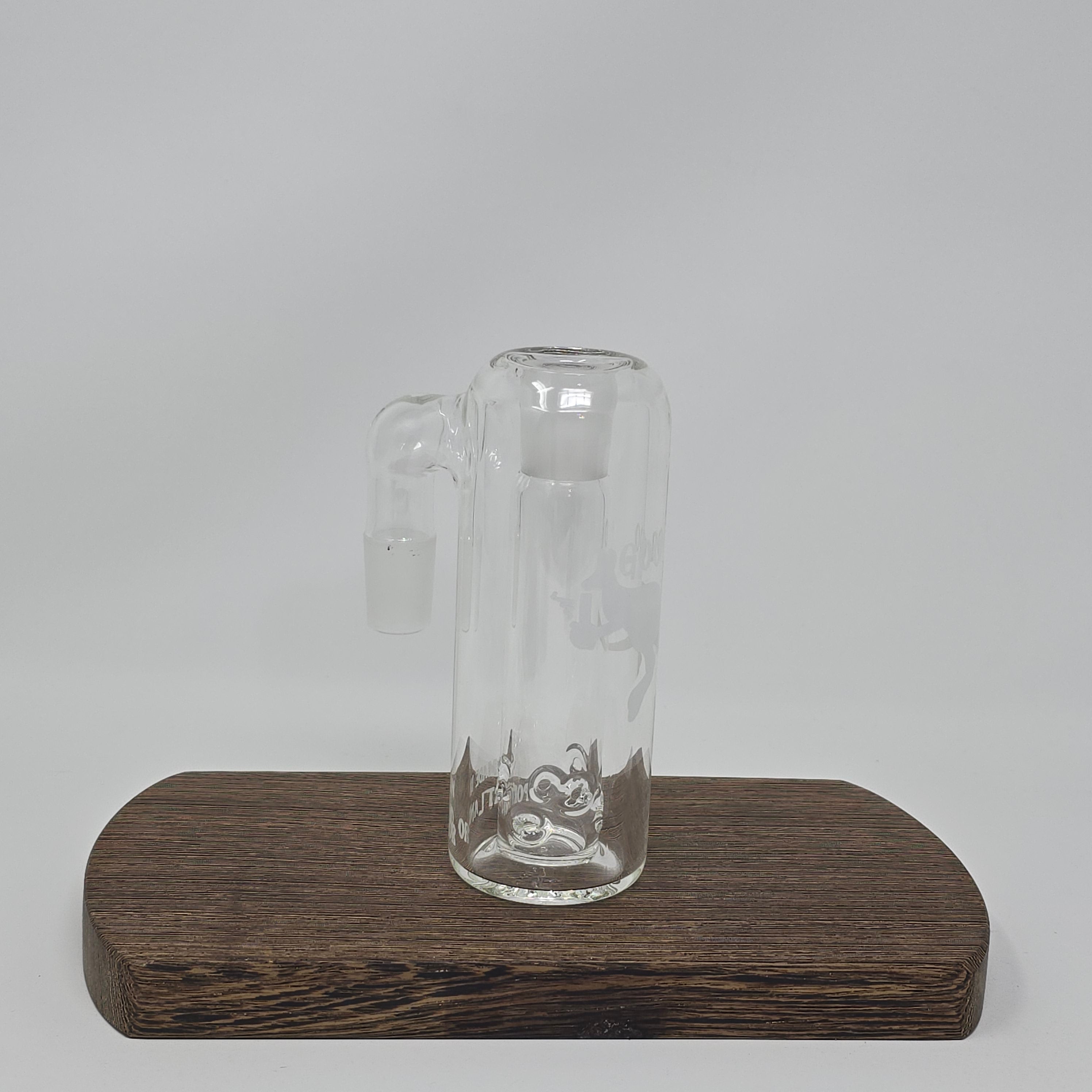 Sick of scoobies in your rig? Snag one of these catchers to help!
All catchers are 90 degrees. Available in 14mm or 19mm male sizes, you can choose from a dry catcher or wet. Pick the extended arm if you want some additional clearance for glass like the 3 Piece HD by Goo Roo Glass.