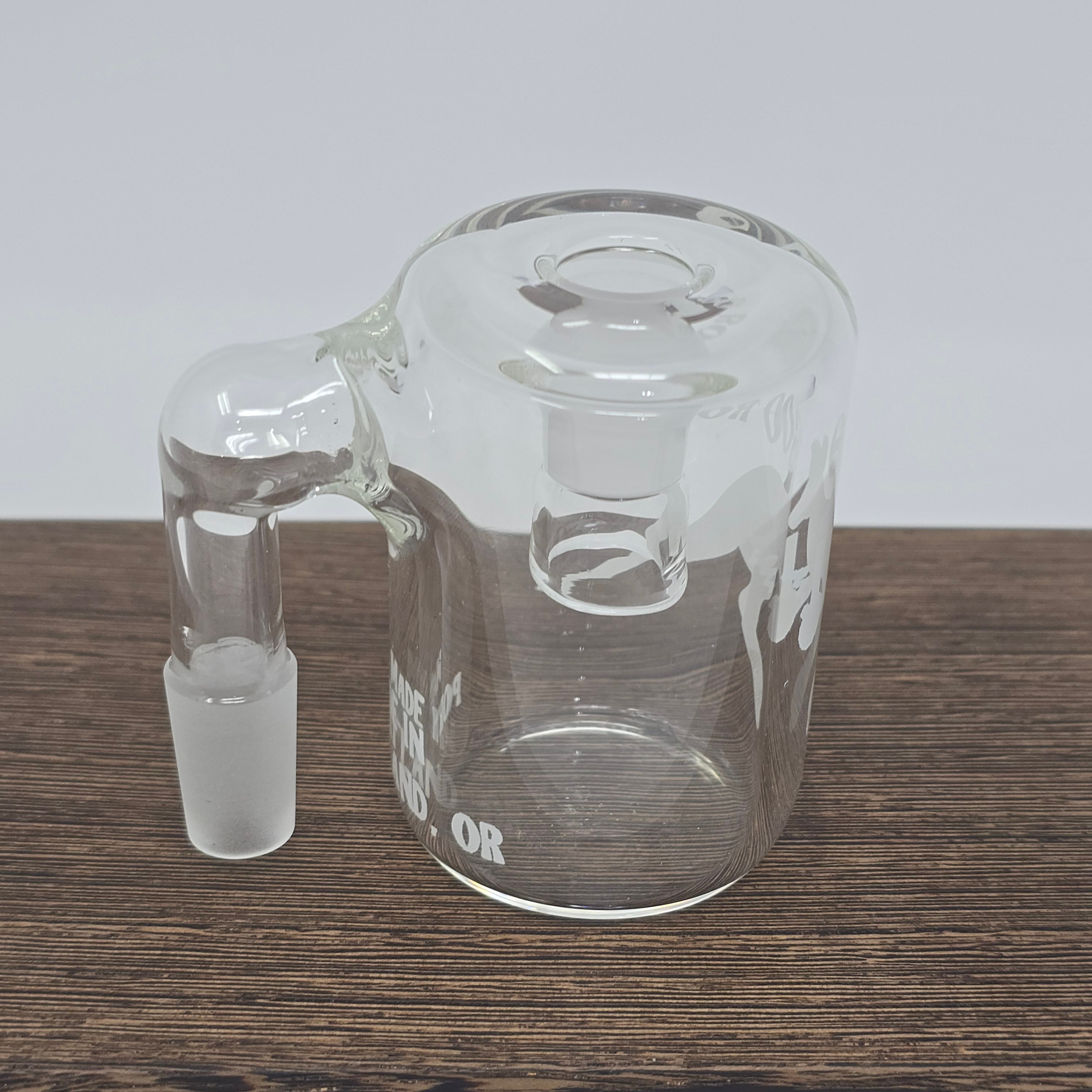 Sick of scoobies in your rig? Snag one of these catchers to help!
All catchers are 90 degrees. Available in 14mm or 19mm male sizes, you can choose from a dry catcher or wet. Pick the extended arm if you want some additional clearance for glass like the 3 Piece HD by Goo Roo Glass.