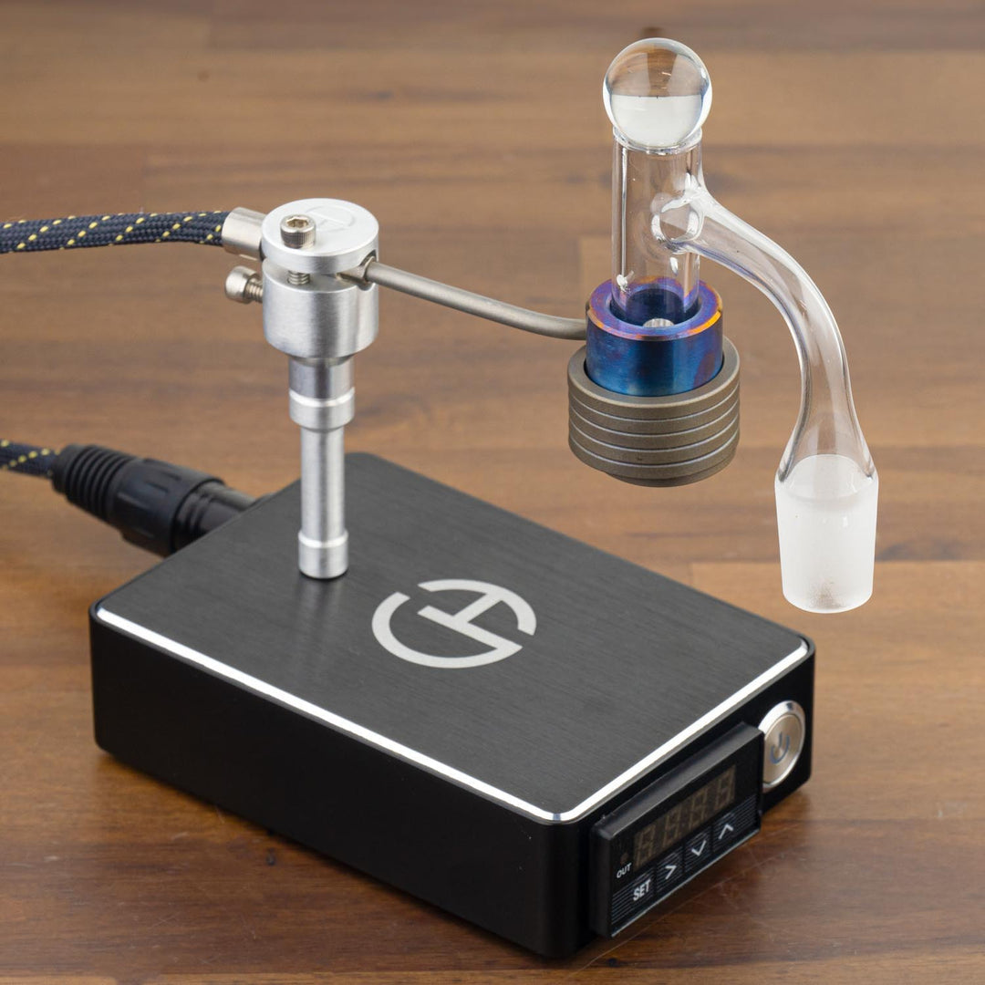 Upgrade your Cannabis Hardware Flowerpot into a wireless vape with Clampy - the revolutionary DIY gadget that pairs with our wireless flower diffusers. Crafted from premium 6061 aluminum. Clampy features a 1/4-20 threaded coil post that securely holds any standard coil. This allows you to use it with any banger or flower diffuser.