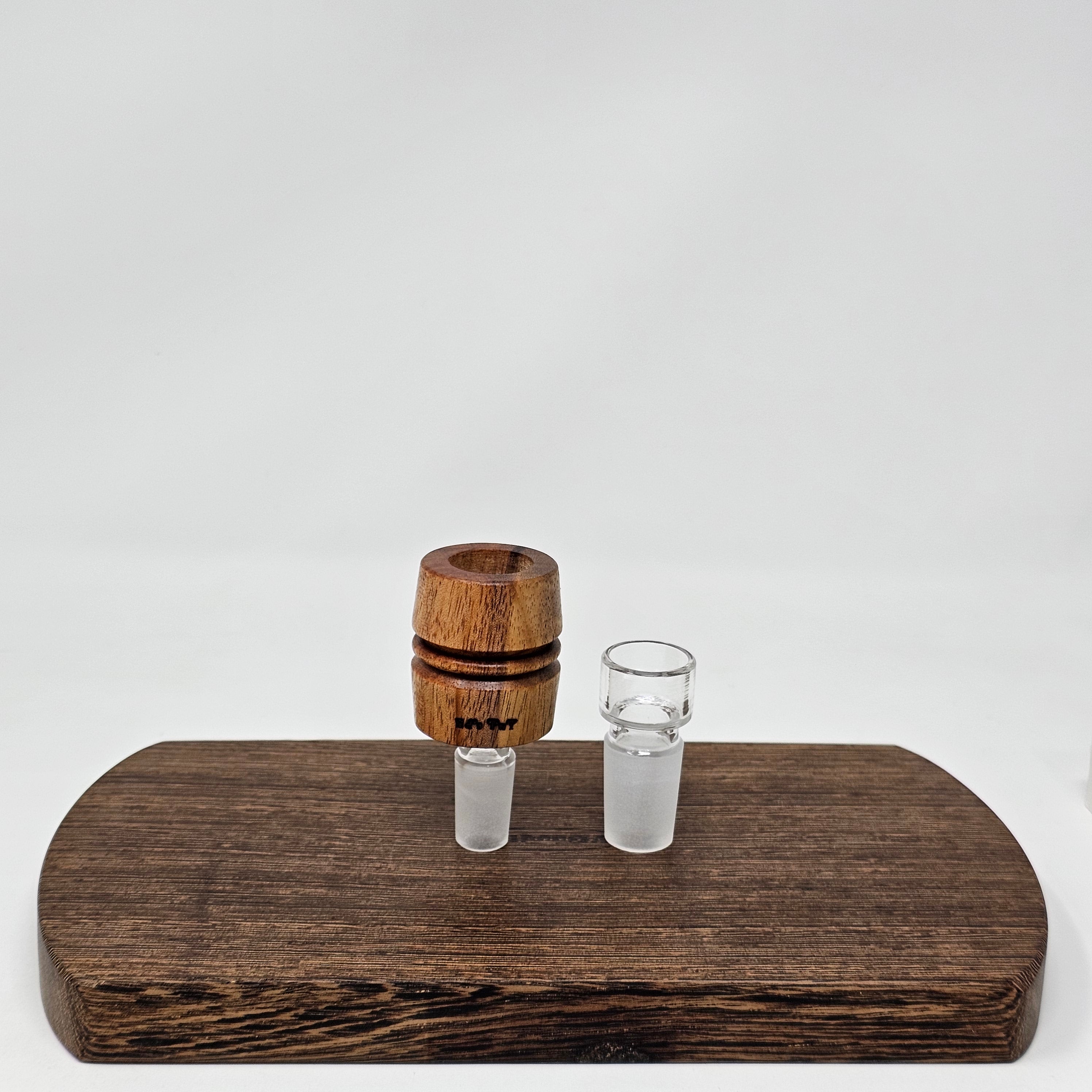 Hand made in Mississippi from Tigerwood. Tigerwood has a lot of color and grain variance so it may differ significantly from the picture.
Glass stand and CT8 not included in purchase just shown for demonstration.
Has a hands free fit with Ruby twist and a looser but airtight seal with CT8.