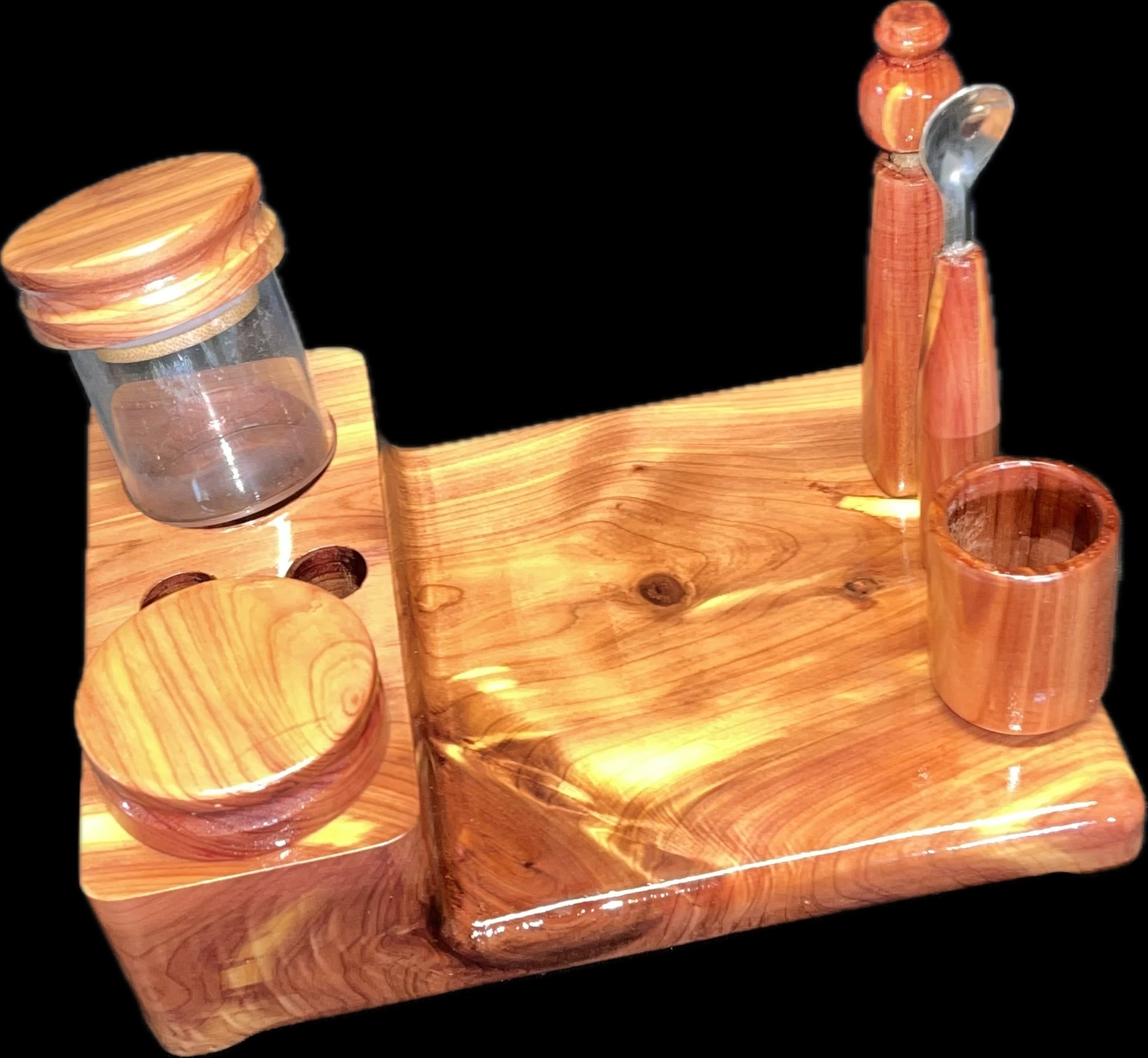 Made in a small family shop in the Southeast United States, each system is unique. This is a true conversation piece of functional art! Each set may contain different parts and of course will offer an individual mixture of woods and beauty only nature can provide.
This particular set includes:
Handmade 6” by 8” Workstation in Cedar
Two Herb Jars
Pick Tool
Stir Tool
Wood Cleaning Brush