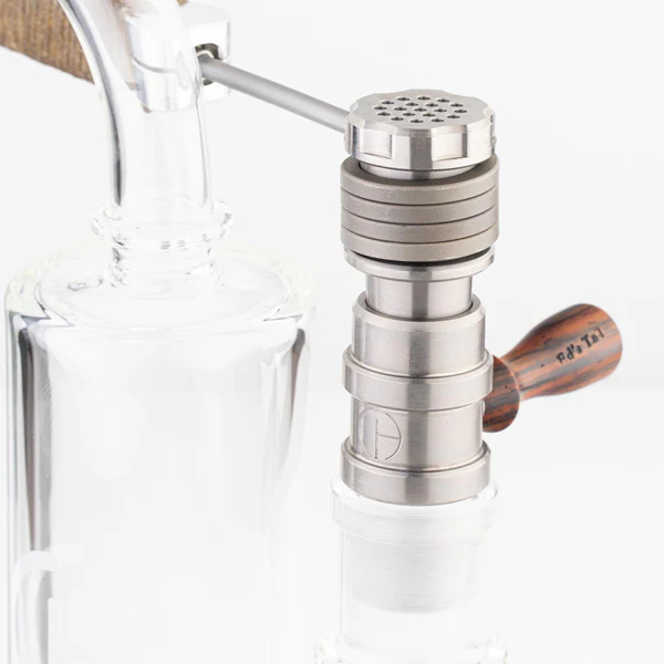 The new Cannabis Hardware Flowerpot F16 Head is created at a time where ball vapes require some refinement. This new Flowerpot Head packs a punch as the heat sink is improved by the addition of a solid titanium machined cap and a machined screen at the bottom which further improves the conduction and retention of heat throughout the device.
There are two barrel designs, the F16 barrel is an injector style "male" head which will sit inside the shovelhead bowl and any other injector style bowl.