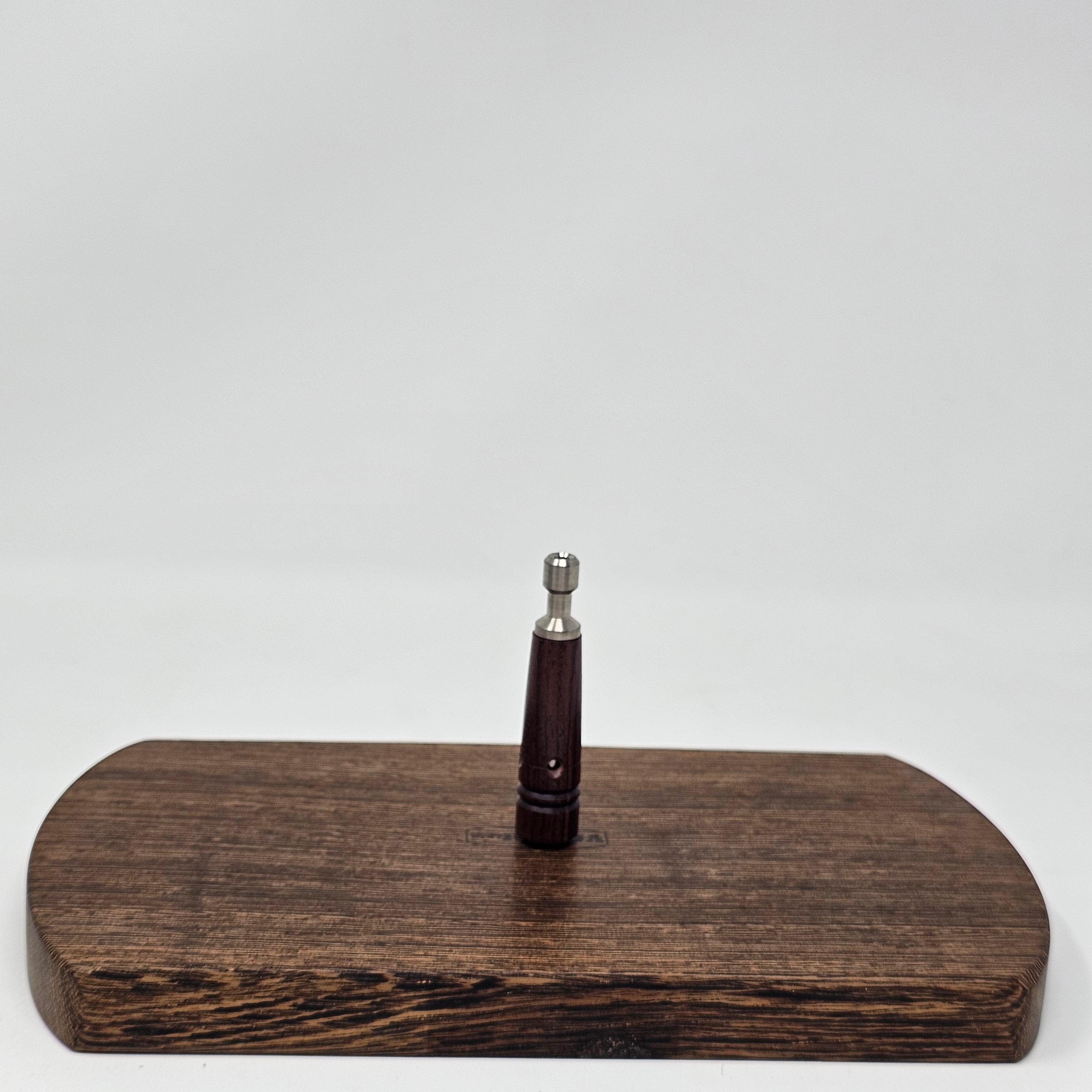 A Vietnamese Tracwood stem by Battery Free Ganz with a stainless steel lining to protect the wood from vapors.
New Design Features:
The new design does not have a carb on its body, making it more convenient to handle.
The wooden part has window holes, allowing you to see the stainless steel lining inside.
An air gap has been introduced between the wooden part and the stainless part. This enhancement is designed to improve the cooling function, allowing vapors to cool down faster and more efficiently.