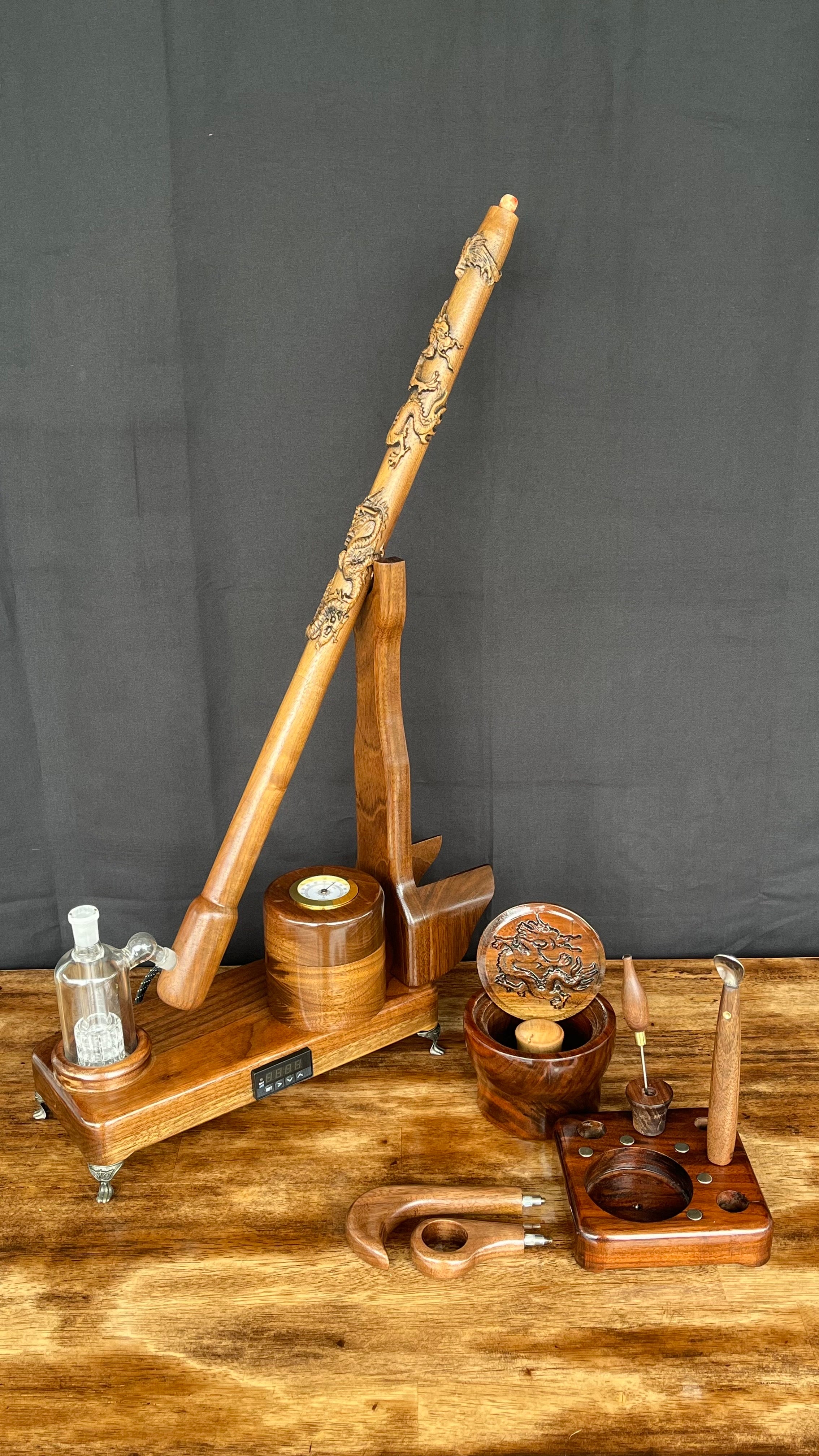 Made in a small family shop in the Southeast United States, each system is unique. This is a true conversation piece of functional art! The Club is 24 inches long and includes carb hole. Each set may contain different parts and of course will offer an individual mixture of woods and beauty only nature can provide.
This particular V2 set includes:
24” Club Pipe ( 3/8” bore) with integrated ash catcher filter system.