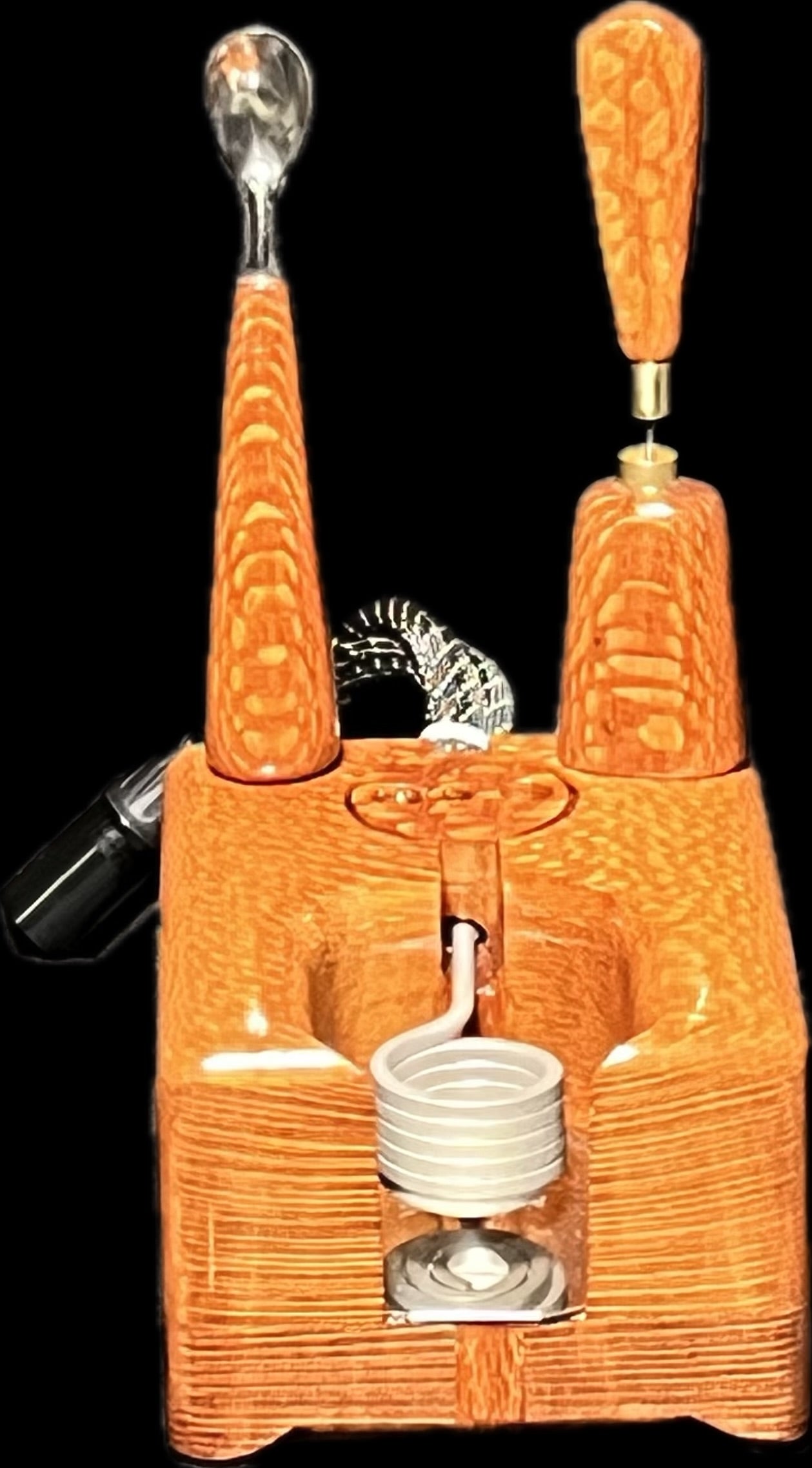 Made in a small family shop in the Southeast United States, each system is unique. This is a true conversation piece of functional art! Each set may contain different parts and of course will offer an individual mixture of woods and beauty only nature can provide.
This particular set includes:
Handmade Leopardwood Dock with Coil Clamp
Leopardwood Wireless Handle and Bowl Set
Scoop and Stir Tool
Optional 25mm Axial Coil
Optional Heater and Bowl Set