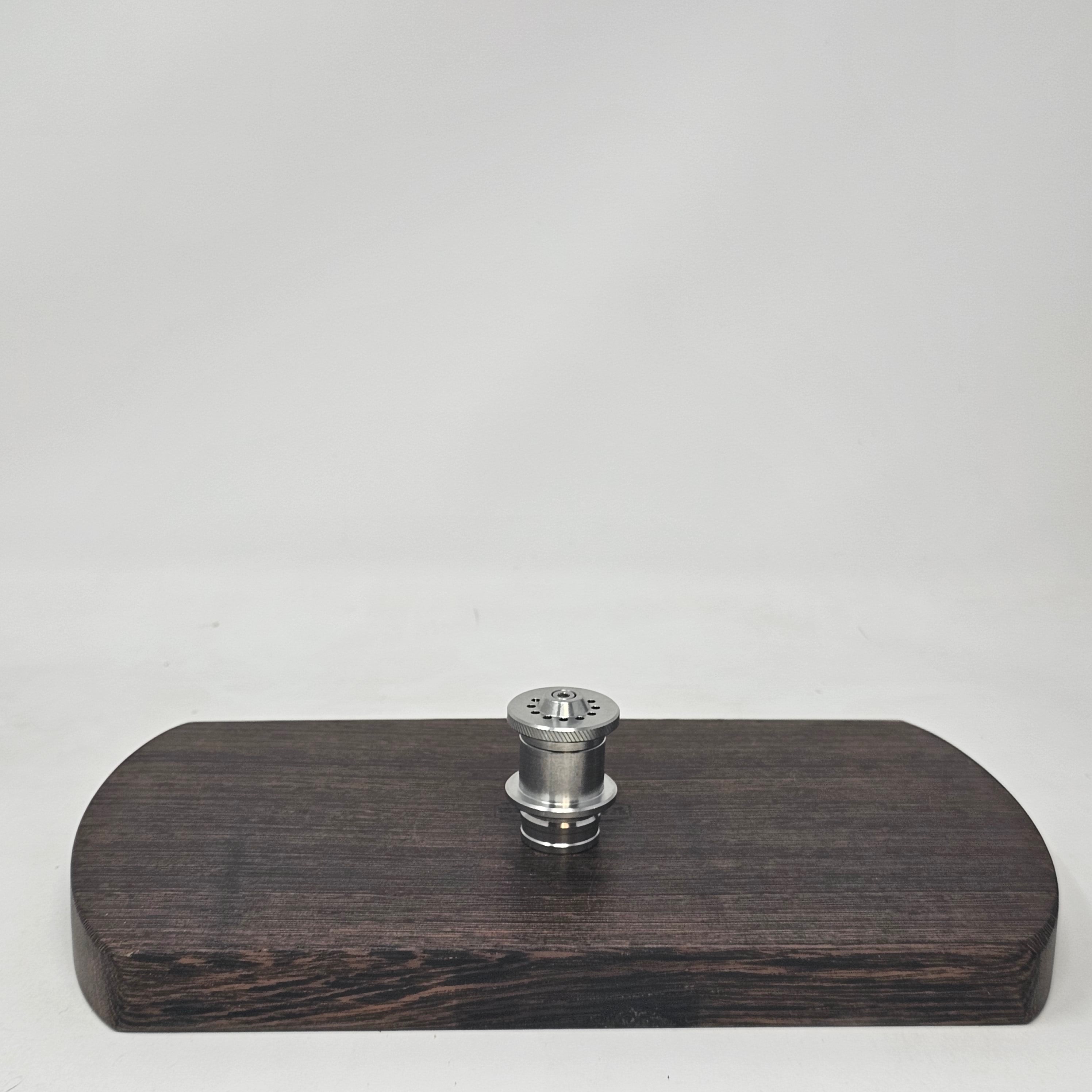 Don't need balls? Choose a solid metal core made of Stainless Steel or Titanium. Hybrid, which is referred to as the Ruby Twist, is made of Titanium and includes 230 gem cut ruby for extra heat calories!