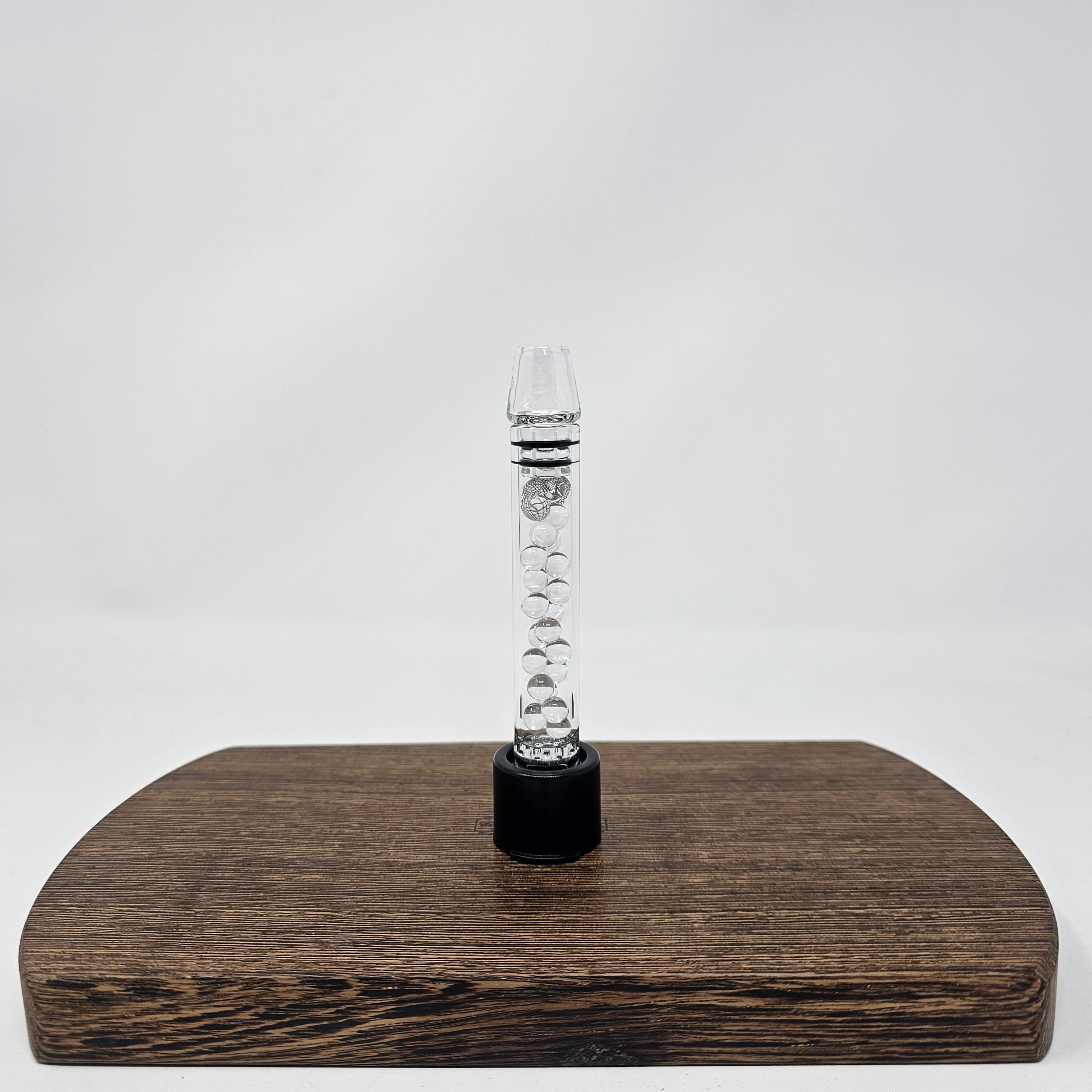 Cool your Venty with this bead filled stem! More streamline than our larger Rocket Stem. Includes removable comfort Glass Tip which allows access to the cooling balls for cleaning.
Filled with 6mm quartz balls for cooling. Built in glass screen. Also will accept conical or basket screens as well as dosing caps.
*Venty for demonstration purposes only. Not included in sale.