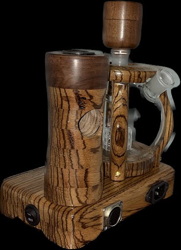 Made in a small family shop in the Southeast United States, each system is unique. This is a true conversation piece of functional art! Each set may contain different parts and of course will offer an individual mixture of woods and beauty only nature can provide.
This particular set includes:
24” whip and 12” wooden mouthpiece with Integrated Orb V2 Bracket System
Integrated PID Controller with US Standard Five Pin XLR Connection w/included Injector Stand
BN-LINK App C Controlled Smart WiFi Outlet Timer
