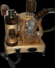 Made in a small family shop in the Southeast United States, each system is unique. This is a true conversation piece of functional art! Each set may contain different parts and of course will offer an individual mixture of woods and beauty only nature can provide.
This particular set includes:
24” whip and 12” wooden mouthpiece with Integrated Orb V2 Bracket System
Integrated PID Controller with US Standard Five Pin XLR Connection w/included Injector Stand
BN-LINK App C Controlled Smart WiFi Outlet Timer