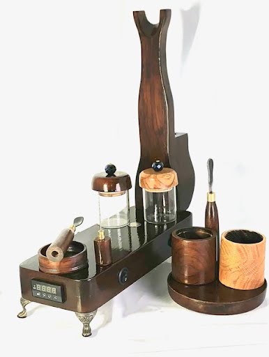 Made in a small family shop in the Southeast United States, each system is unique. This is a true conversation piece of functional art! The Club is 24 inches long and includes carb hole. Each set may contain different parts and of course will offer an individual mixture of woods and beauty only nature can provide.
This particular V1 set includes:
18” Club Pipe ( 1/4” bore) with integrated ash catcher filter system.
Integrated PID Controller with US Standard Five Pin XLR Connection w/included Injector…