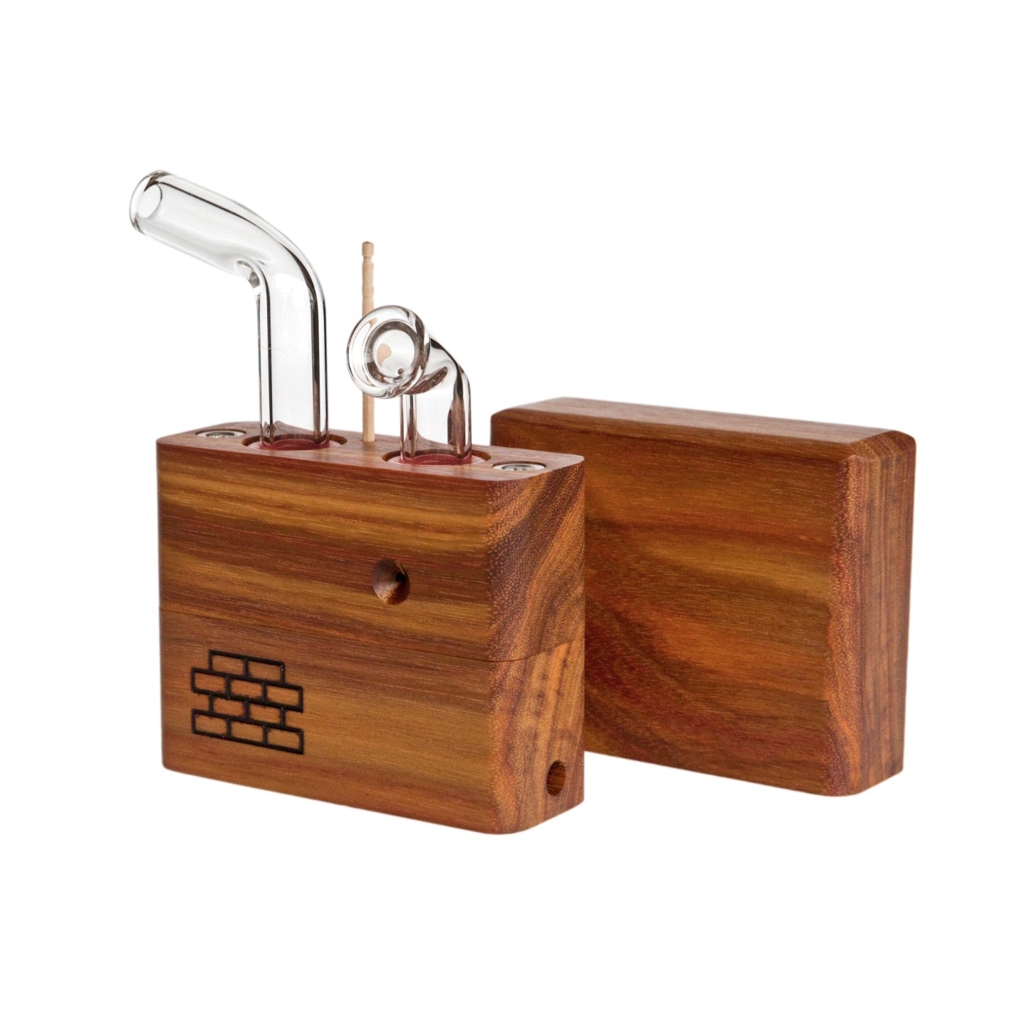 The Sticky Brick Junior is our butane-powered portable. Measuring 4.5 inches tall, 3 inches wide, and 1 inch thick, it will fit right in your pocket or bag to take on the go. The protective cap secures with the same extra-strong, rare earth magnets that we use in all of our devices. As with all of our Sticky Bricks, the wooden body and the glass are worked by hand right here in our workshop.