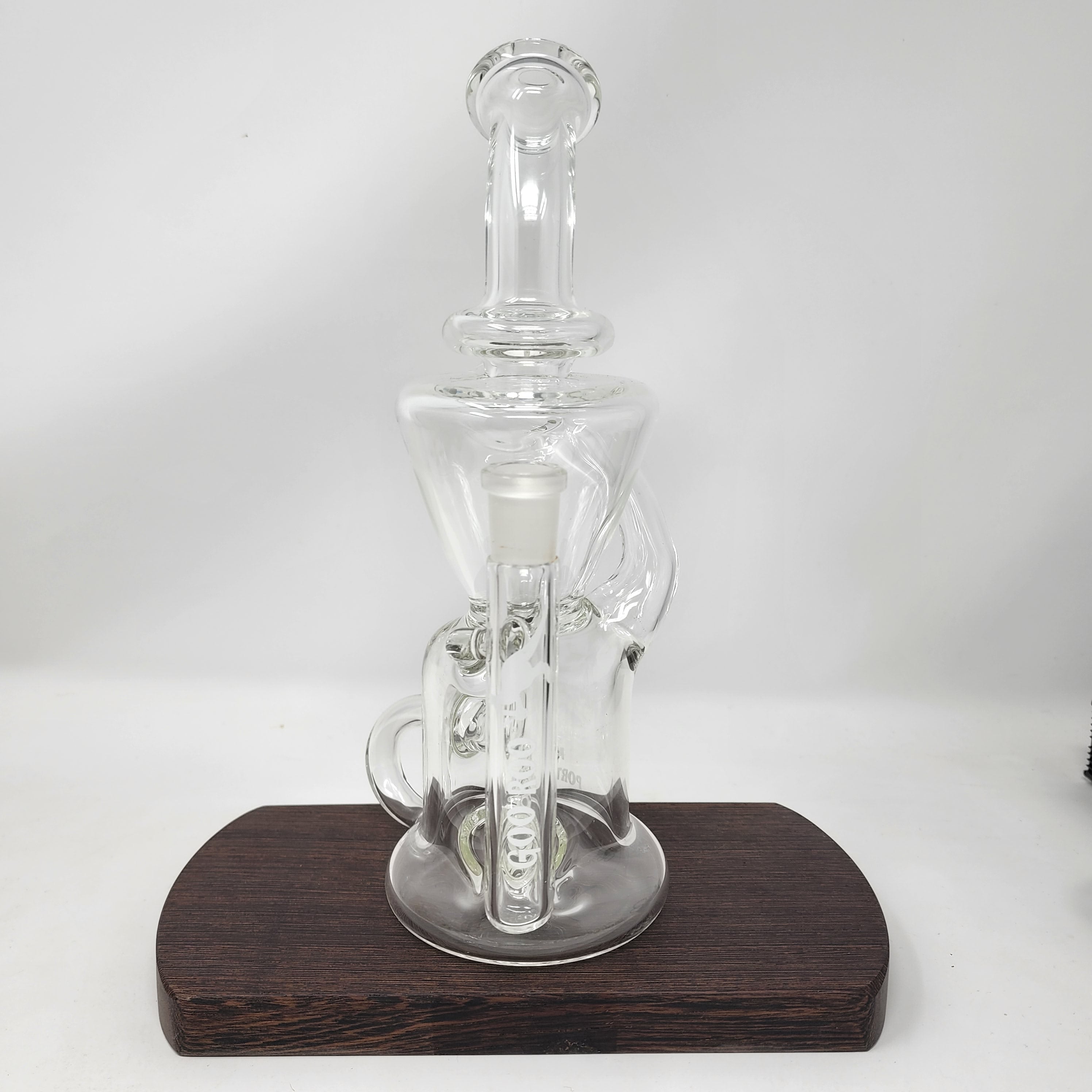A Goo Roo Glass flagship rig, the Klein recycler has incredible function and appearance. Fitting is 14mm Female. Made in USA!
** This product is individually handmade by the same or different glass blower and there may be a variation in size of product. There could also be a variation in the logo size, placement, and color…