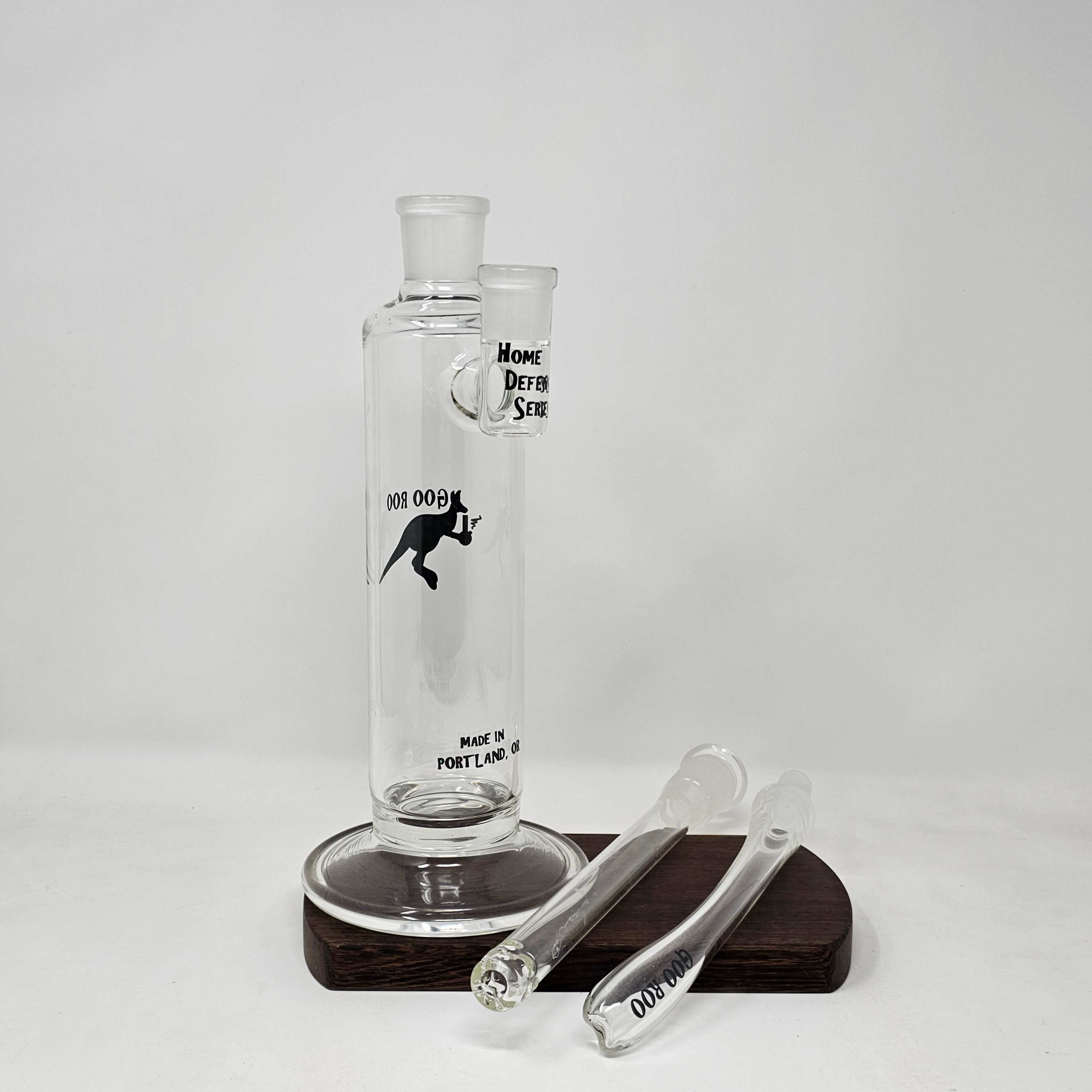 This bubbler is made on 65mm heavy walled tubing and comes with a jumbo in-house diffused 9-hole double ground bushing down stem (18mm female). Mouthpiece is removable and fits on a 19 mm fitting. Down stem is also removable for easier cleaning.
Height of body 11-12" with mouth piece 17-18". Made in the USA!!!
** This product is individually handmade by the same or different glass blower and there may be a variation in size of product. There could also be a variation in the logo size, placement, and col…