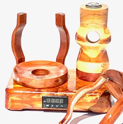 Made in a small family shop in the Southeast United States, each system is unique. This is a true conversation piece of functional art! Each set may contain different parts and of course will offer an individual mixture of woods and beauty only nature can provide.
This particular set includes:
24” whip and 12” wooden mouthpiece with Integrated Orb V2 Bracket System
Integrated PID Controller with US Standard Five Pin XLR Connection w/included Injector Stand
19mm Male Handmade Bowl with Glass Filter
