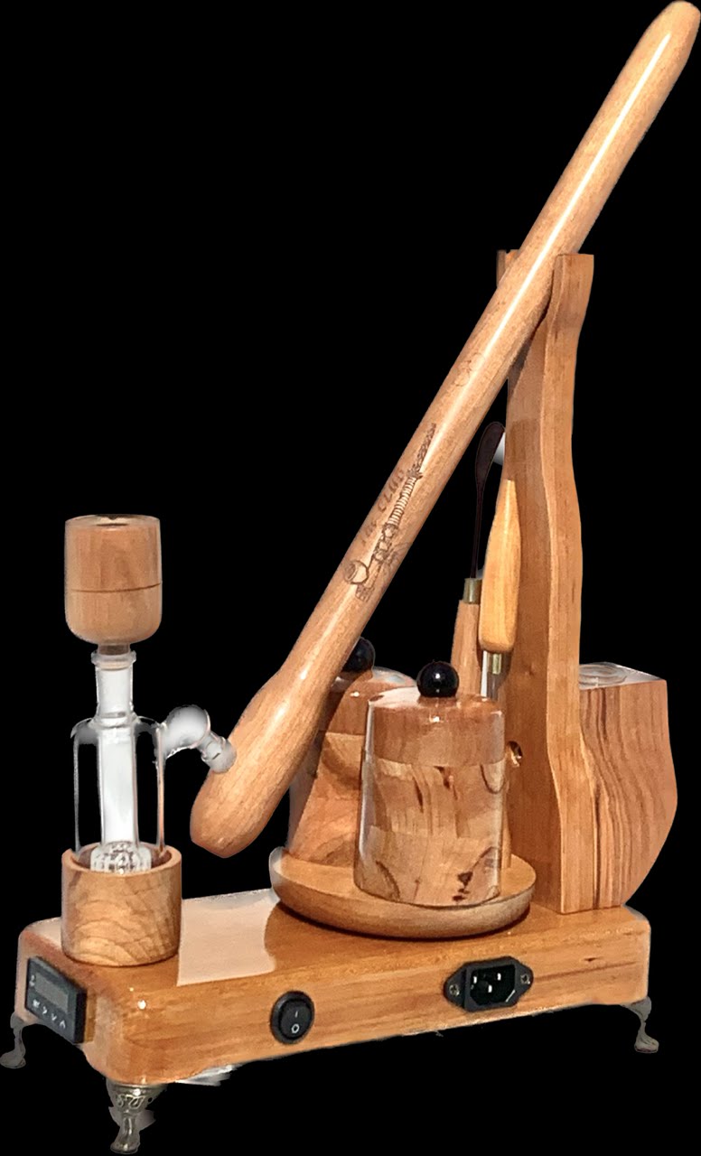 Made in a small family shop in the Southeast United States, each system is unique. This is a true conversation piece of functional art! The Club is 24 inches long and includes carb hole. Each set may contain different parts and of course will offer an individual mixture of woods and beauty only nature can provide.
This particular V1 set includes:
18” Club Pipe ( 1/4” bore) with integrated ash catcher filter system.
Integrated PID Controller with US Standard Five Pin XLR Connection w/included Injector…