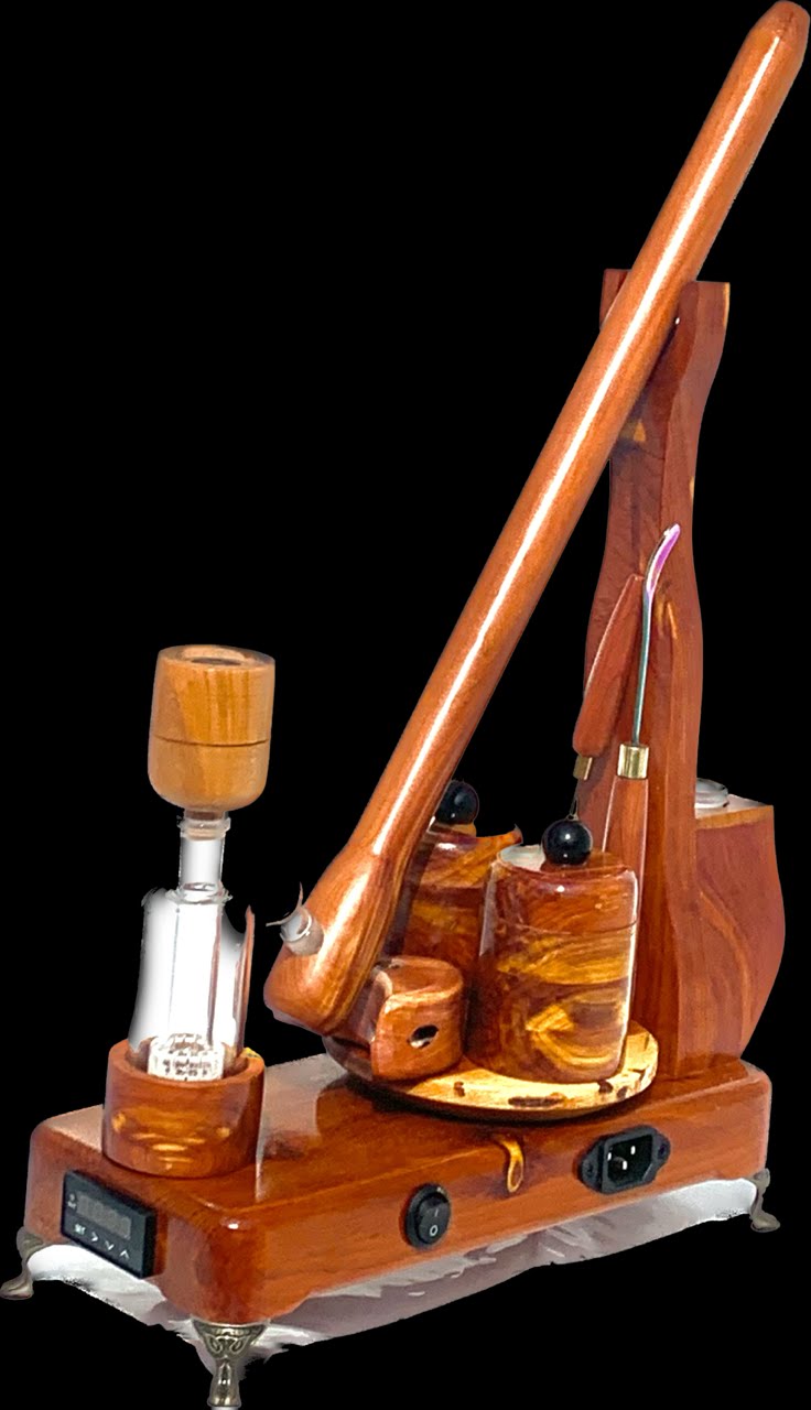 Made in a small family shop in the Southeast United States, each system is unique. This is a true conversation piece of functional art! The Club is 24 inches long and includes carb hole. Each set may contain different parts and of course will offer an individual mixture of woods and beauty only nature can provide.
This particular V1 set includes:
18” Club Pipe ( 1/4” bore) with integrated ash catcher filter system.
Integrated PID Controller with US Standard Five Pin XLR Connection w/included Injector…