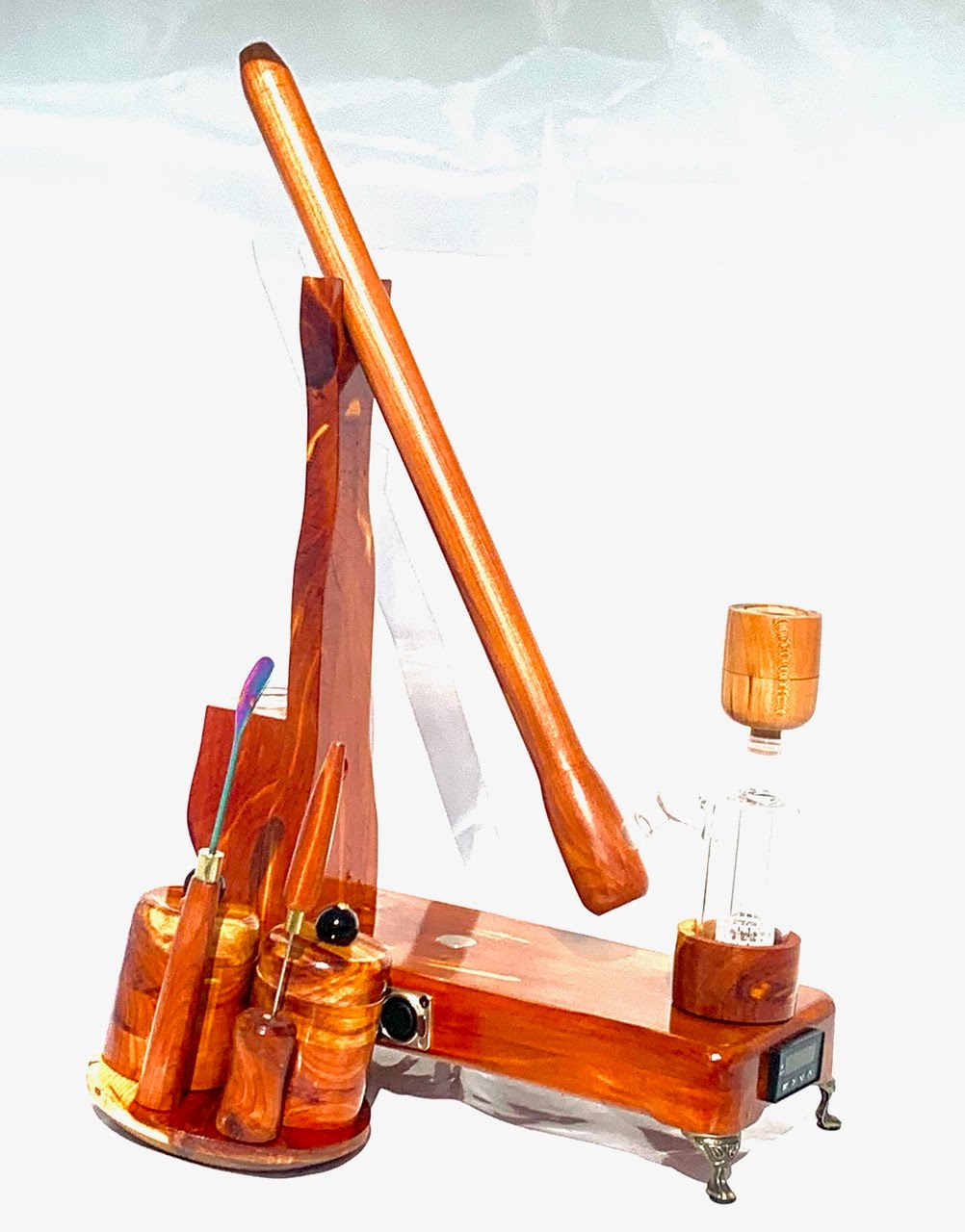 Made in a small family shop in the Southeast United States, each system is unique. This is a true conversation piece of functional art! The Club is 24 inches long and includes carb hole. Each set may contain different parts and of course will offer an individual mixture of woods and beauty only nature can provide.
This particular V1 set includes:
18” Club Pipe ( 1/4” bore) with integrated ash catcher filter system.
Integrated PID Controller with US Standard Five Pin XLR Connection w/included Injector…