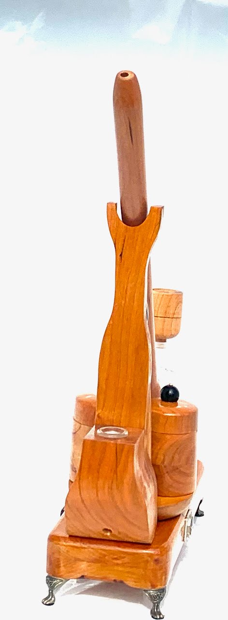 Made in a small family shop in the Southeast United States, each system is unique. This is a true conversation piece of functional art! The Club is 24 inches long and includes carb hole. Each set may contain different parts and of course will offer an individual mixture of woods and beauty only nature can provide.
This particular V1 set includes:
18” Club Pipe ( 1/4” bore) with integrated ash catcher filter system.
Integrated PID Controller with US Standard Five Pin XLR Connection w/included Injector…