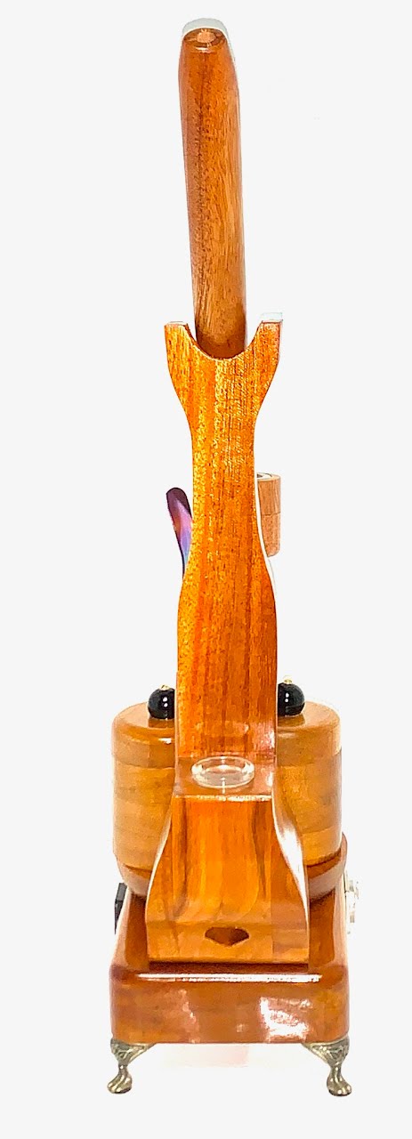 Made in a small family shop in the Southeast United States, each system is unique. This is a true conversation piece of functional art! The Club is 24 inches long and includes carb hole. Each set may contain different parts and of course will offer an individual mixture of woods and beauty only nature can provide.
This particular V1 set includes:
18” Club Pipe ( 1/4” bore) with integrated ash catcher filter system.
Integrated PID Controller with US Standard Five Pin XLR Connection w/included Injector…