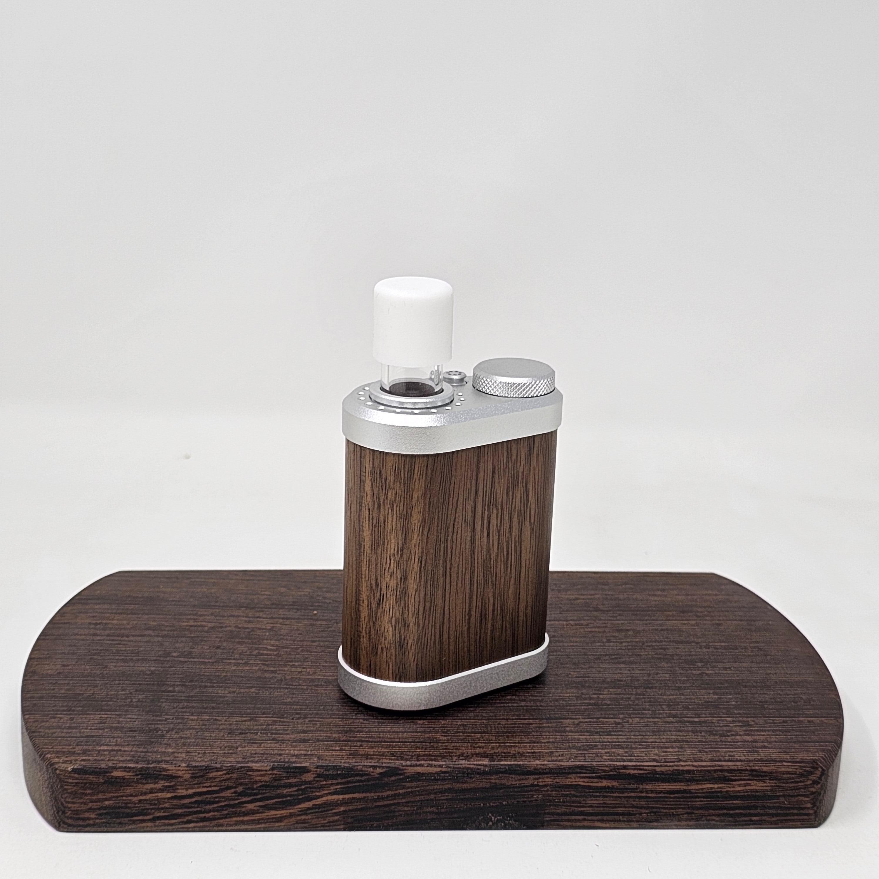 Two caps. Use for preloaded stems or to keep the smell down. Tinymight unit, stem and accessories not included. You are purchasing two white caps.
