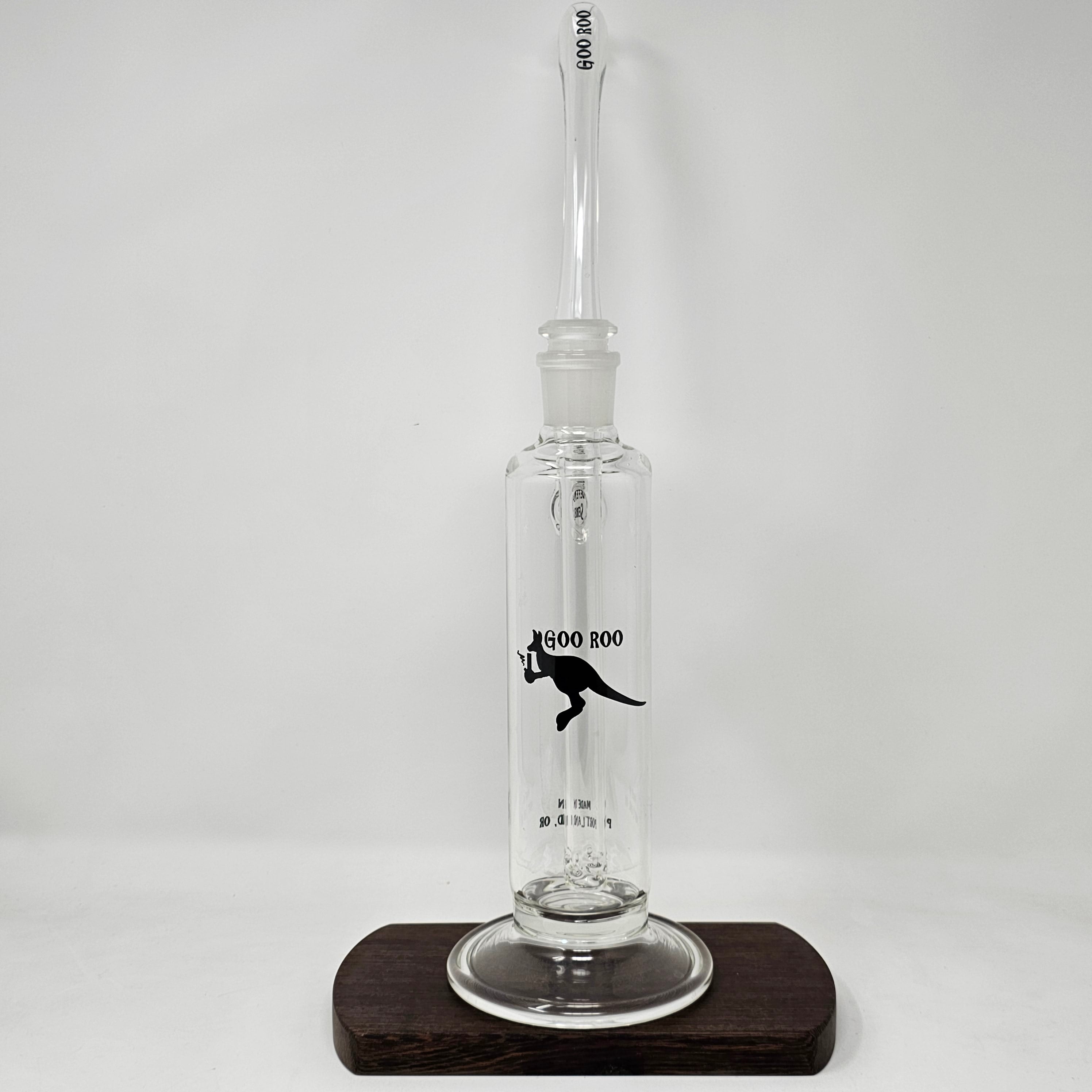 This bubbler is made on 65mm heavy walled tubing and comes with a jumbo in-house diffused 9-hole double ground bushing down stem (18mm female). Mouthpiece is removable and fits on a 19 mm fitting. Down stem is also removable for easier cleaning.
Height of body 11-12" with mouth piece 17-18". Made in the USA!!!
** This product is individually handmade by the same or different glass blower and there may be a variation in size of product. There could also be a variation in the logo size, placement, and col…