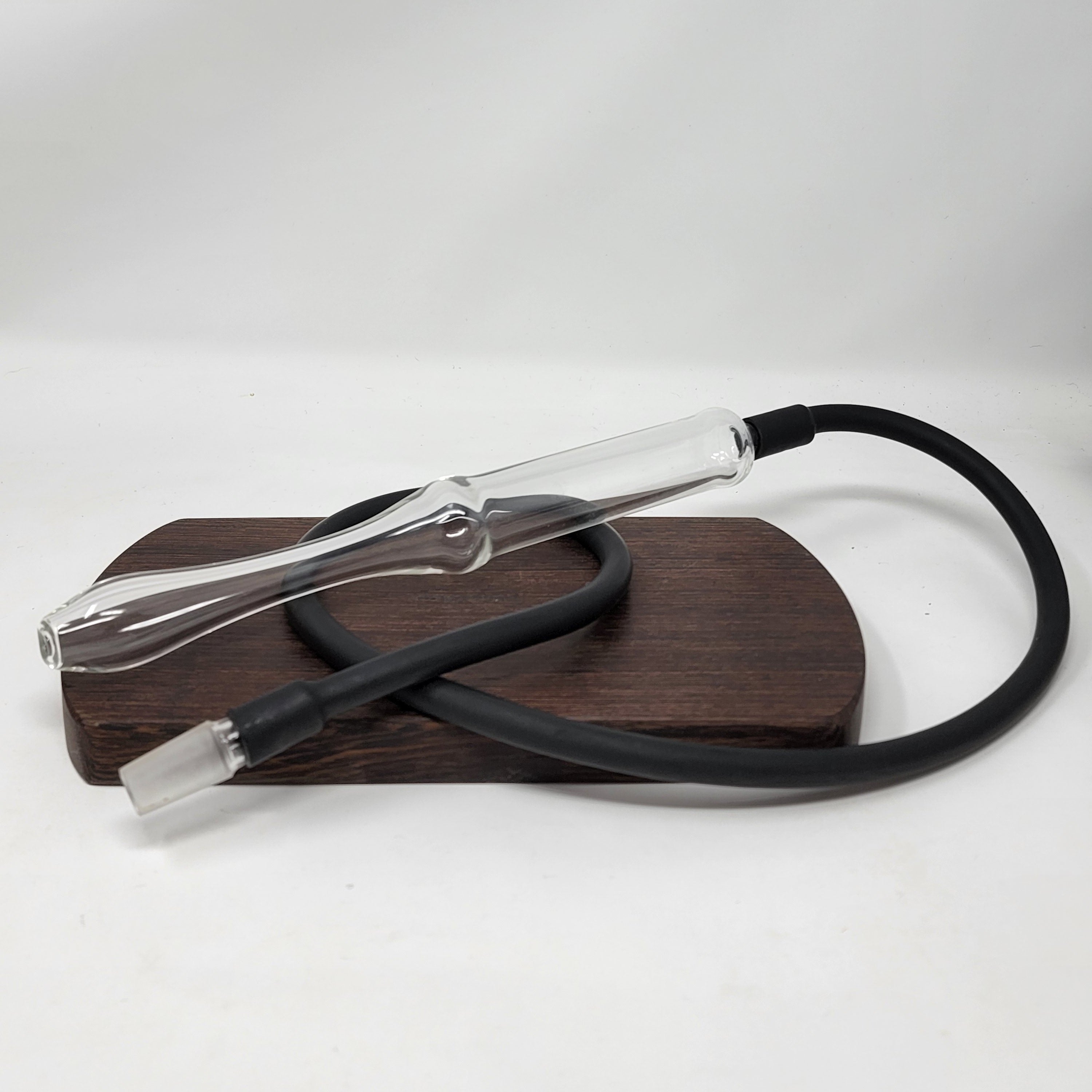 A replacement mouthpiece for the Goo Roo Hookah. Made in the USA!!! 14mm Male fitting for 14mm Female connection.
Hookah Bubbler for demonstration only. You are just purchasing the Mouthpiece, Black Whip Tubing and 14mm male whip attachment only!