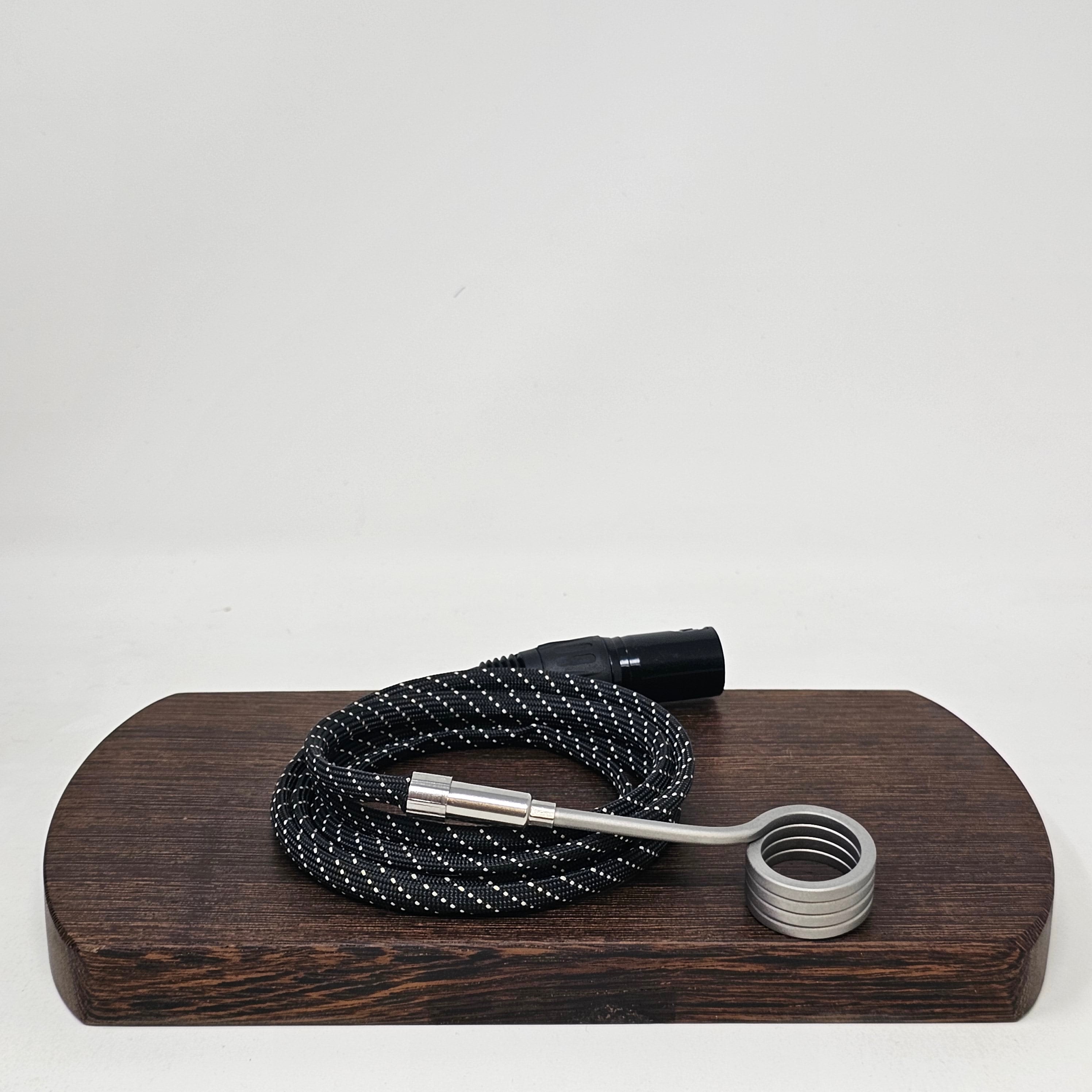 20mm Enail Coil for XLR Controllers (Works with Auber and Disorderly Conduction PID's or others with the identical pinout below. Does not work with high five and others with XLR but DIFFERENT pinout. 

Braided Kevlar Sheath Protects Wires
Available in 110v or 220v
110v Works in North America
220v Works in UK, EU, AU
5 wraps
30 day warranty. 

Optional handle(s)
Cannabis Hardware Aluminum Handle
Ed's TnT Cocobolo Wood Handle
Ed's TnT Tigerwood Handle
O’Connell Woodworks TKO Handle
