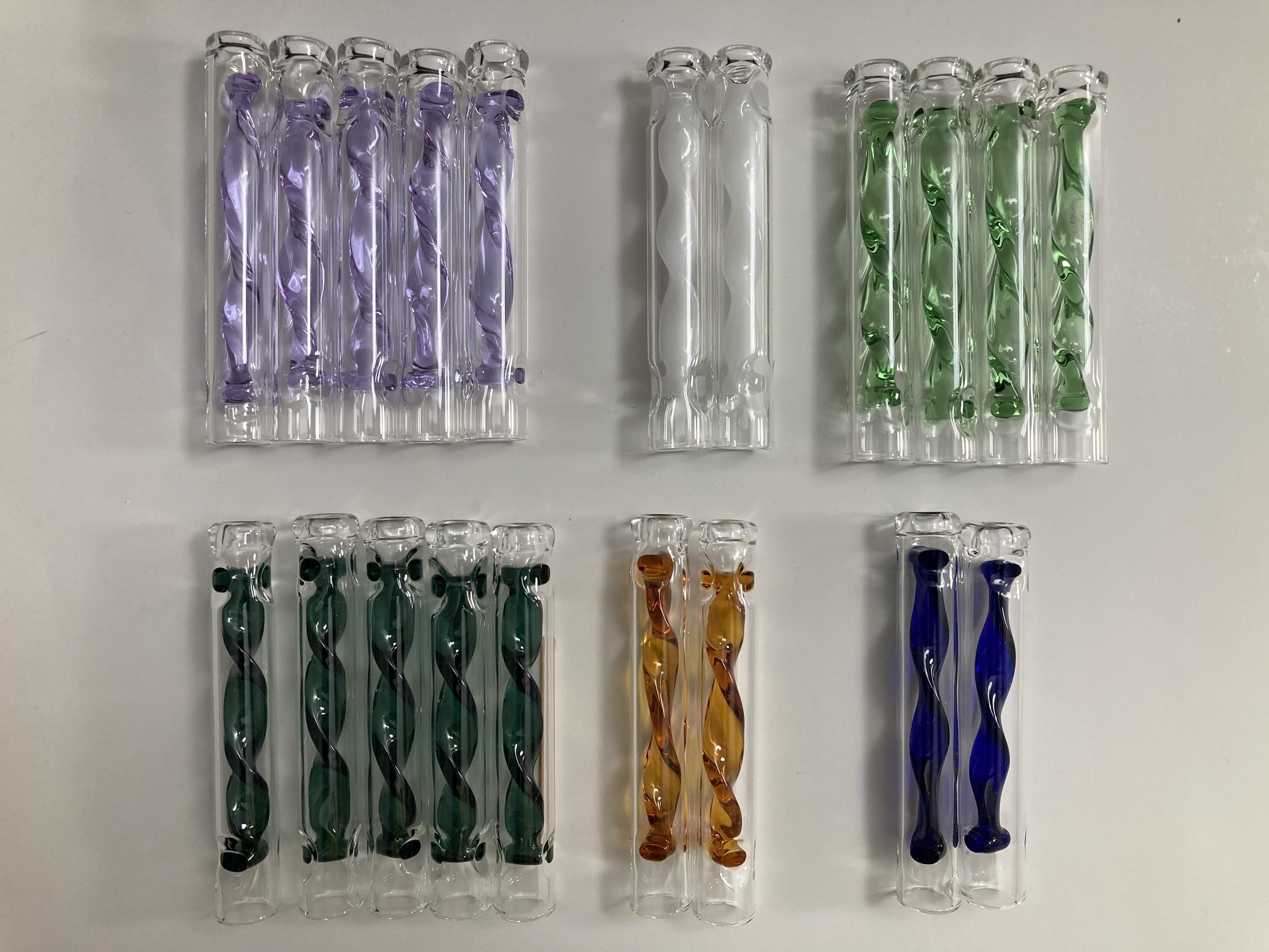 Handmade in the Mid-Atlantic United States! Thick boro with color cooling spirals!

May work with DynaVap tips and the Thermal Accumulator as well. That said, do not force it. If it feels too tight it's probably has a tolerance issue on the tip or potentially the glass. We are not responsible if you break your glass. Please be careful when testing fitment.