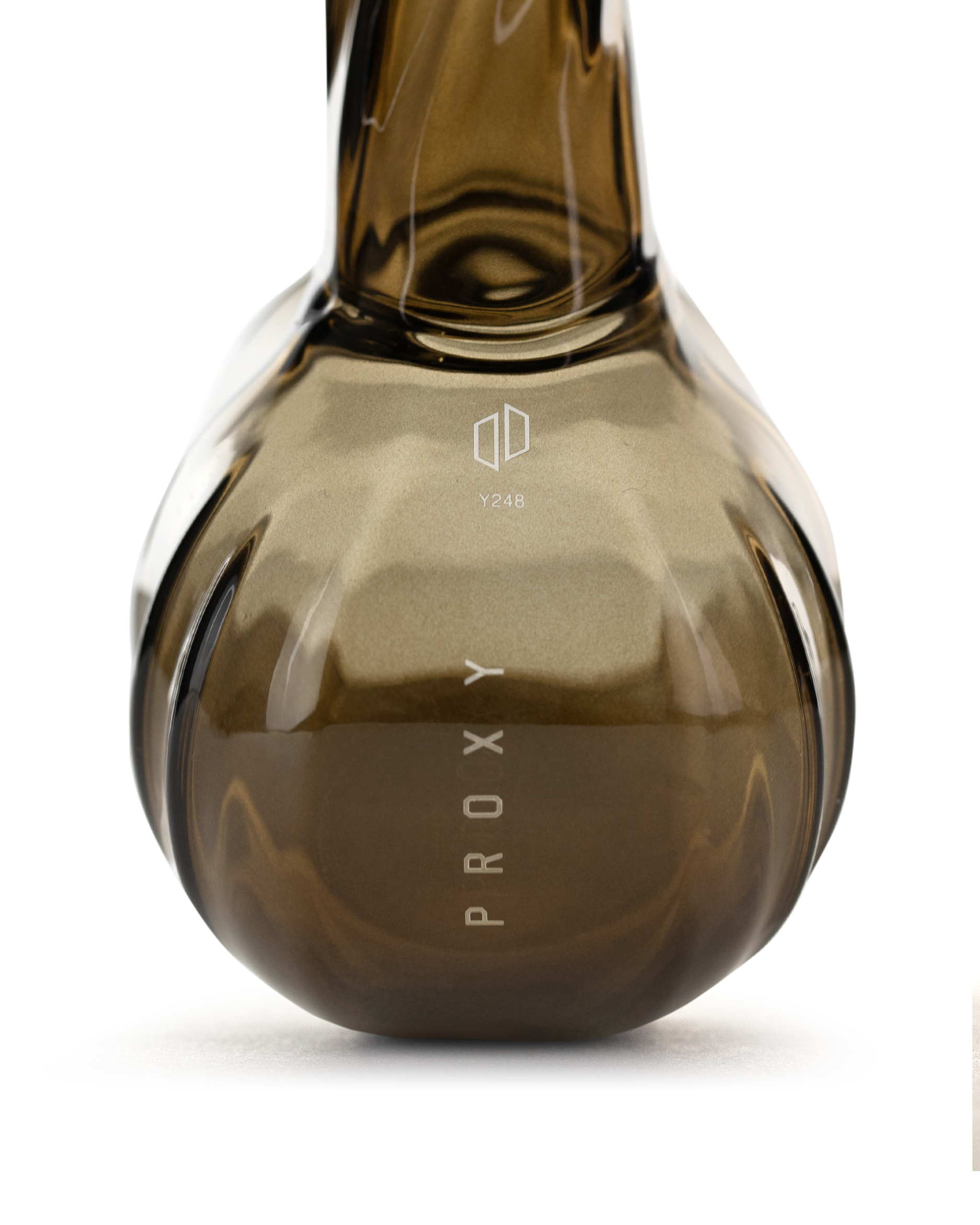 Hash is magic. The Proxy Wizard is an enchanting dry pipe with a longer spiral stem, allowing the vapor to cool before it reaches your mouth. The bowl is crafted with your hand in mind, featuring ergonomic grooves for a comfortable, secure grip. Made from hand-blown borosilicate glass, this legendary addition to the Proxy Collection is a true statement Piece. +10 Charisma.