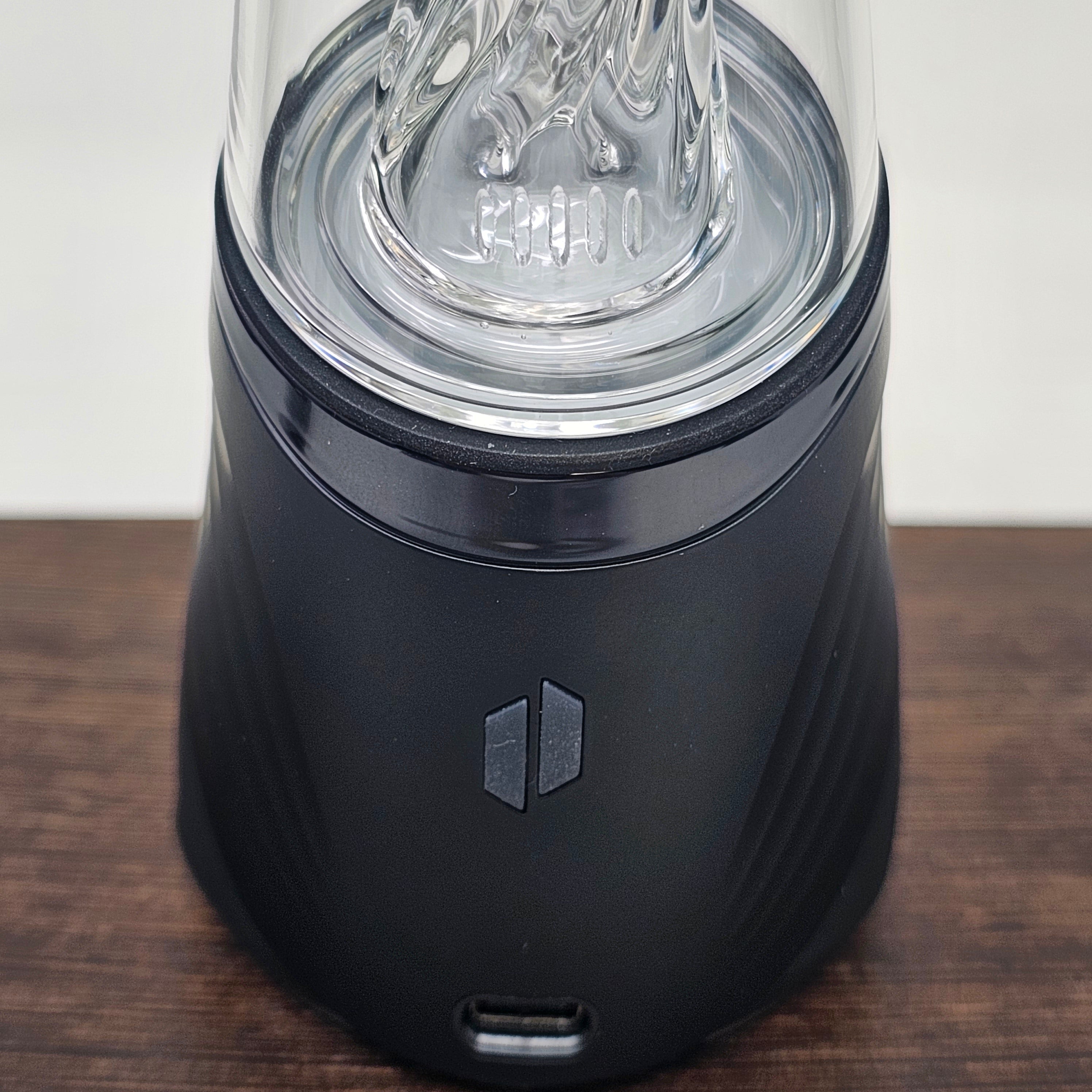 The Peak Pro (2023) is the pinnacle of hash technology. This premium smart rig delivers incredible flavor and unparalleled performance. Unlock the fullest potential of the plant with its single-button interface, deep customization via the Puffco Connect app, and patented 3D Chamber. Featuring the Joystick Cap and laser cut perc slots for improved water filtration. Currently available in Black and Pearl White.