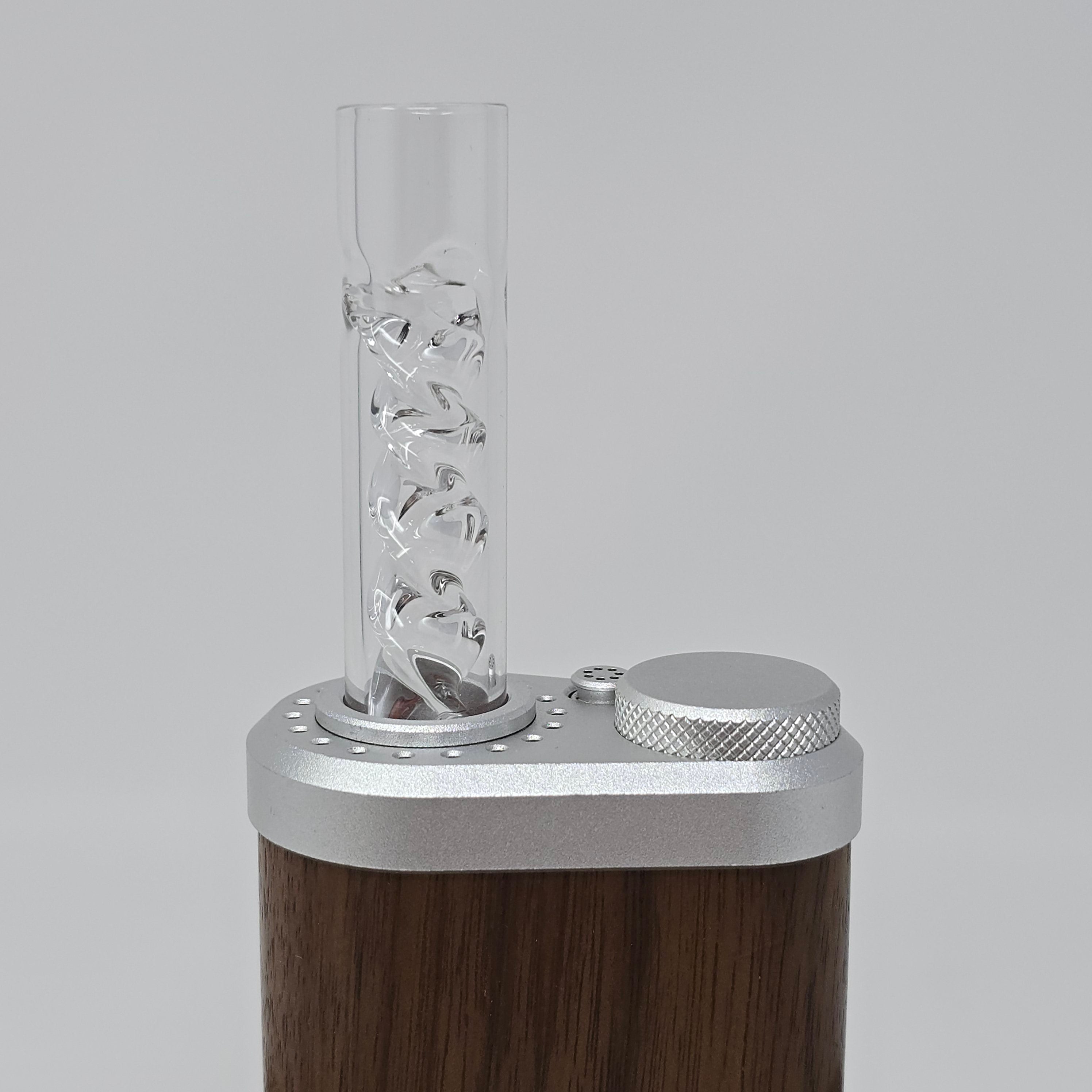 Handmade in the Mid-Atlantic United States! Thick borosilicate with cooling spirals!

May work with DynaVap tips and the Thermal Accumulator as well. That said, do not force it. If it feels too tight it's probably has a tolerance issue on the tip or potentially the glass. We are not responsible if you break your glass. Please be careful when testing fitment.