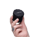 Black 2.5" 4-Piece Assembled Grinder in Hand View for Size Reference