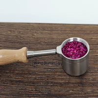 Combination heater with diffuser and injector functions. Premium heat diffusion with 520 3mm gem-cut rubies for even heating and flavor. Compatible with 25mm axial coils, various bowls, 18mm and 14mm glass rigs (recommended 18mm). Durable wooden handle. Titanium diffuser for long-lasting performance.