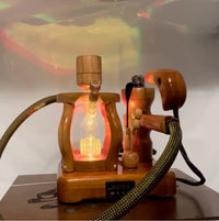 Made in a small family shop in the Southeast United States, each system is unique. This is a true conversation piece of functional art! Each set may contain different parts and of course will offer an individual mixture of woods and beauty only nature can provide.

This particular set includes:

24” whip and 12” wooden mouthpiece with Integrated Orb V2 Bracket System
Integrated PID Controller with US Standard Five Pin XLR Connection w/included Injector Stand
BN-LINK App C Controlled Smart WiFi Outlet Timer