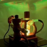 Made in a small family shop in the Southeast United States, each system is unique. This is a true conversation piece of functional art! Each set may contain different parts and of course will offer an individual mixture of woods and beauty only nature can provide.

This particular set includes:

24” whip and 12” wooden mouthpiece with Integrated Orb V2 Bracket System
Integrated PID Controller with US Standard Five Pin XLR Connection w/included Injector Stand
BN-LINK App C Controlled Smart WiFi Outlet Timer