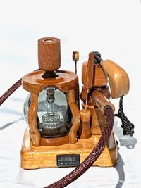 Made in a small family shop in the Southeast United States, each system is unique. This is a true conversation piece of functional art! Each set may contain different parts and of course will offer an individual mixture of woods and beauty only nature can provide.

This particular set includes:

24” whip and 12” wooden mouthpiece with Integrated Orb V2 Bracket System
Integrated PID Controller with US Standard Five Pin XLR Connection w/included Injector Stand
BN-LINK App C Controlled Smart WiFi Outlet Timer