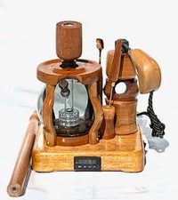 Made in a small family shop in the Southeast United States, each system is unique. This is a true conversation piece of functional art! Each set may contain different parts and of course will offer an individual mixture of woods and beauty only nature can provide.

This particular set includes:

24” whip and 12” wooden mouthpiece with Integrated Orb V2 Bracket System
Integrated PID Controller with US Standard Five Pin XLR Connection w/included Injector Stand
BN-LINK App C Controlled Smart WiFi Outlet Timer