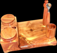 Made in a small family shop in the Southeast United States, each system is unique. This is a true conversation piece of functional art! Each set may contain different parts and of course will offer an individual mixture of woods and beauty only nature can provide.

This particular set includes:

Handmade 6” by 8” Workstation in Cedar
Two Herb Jars
Pick Tool
Stir Tool
Wood Cleaning Brush