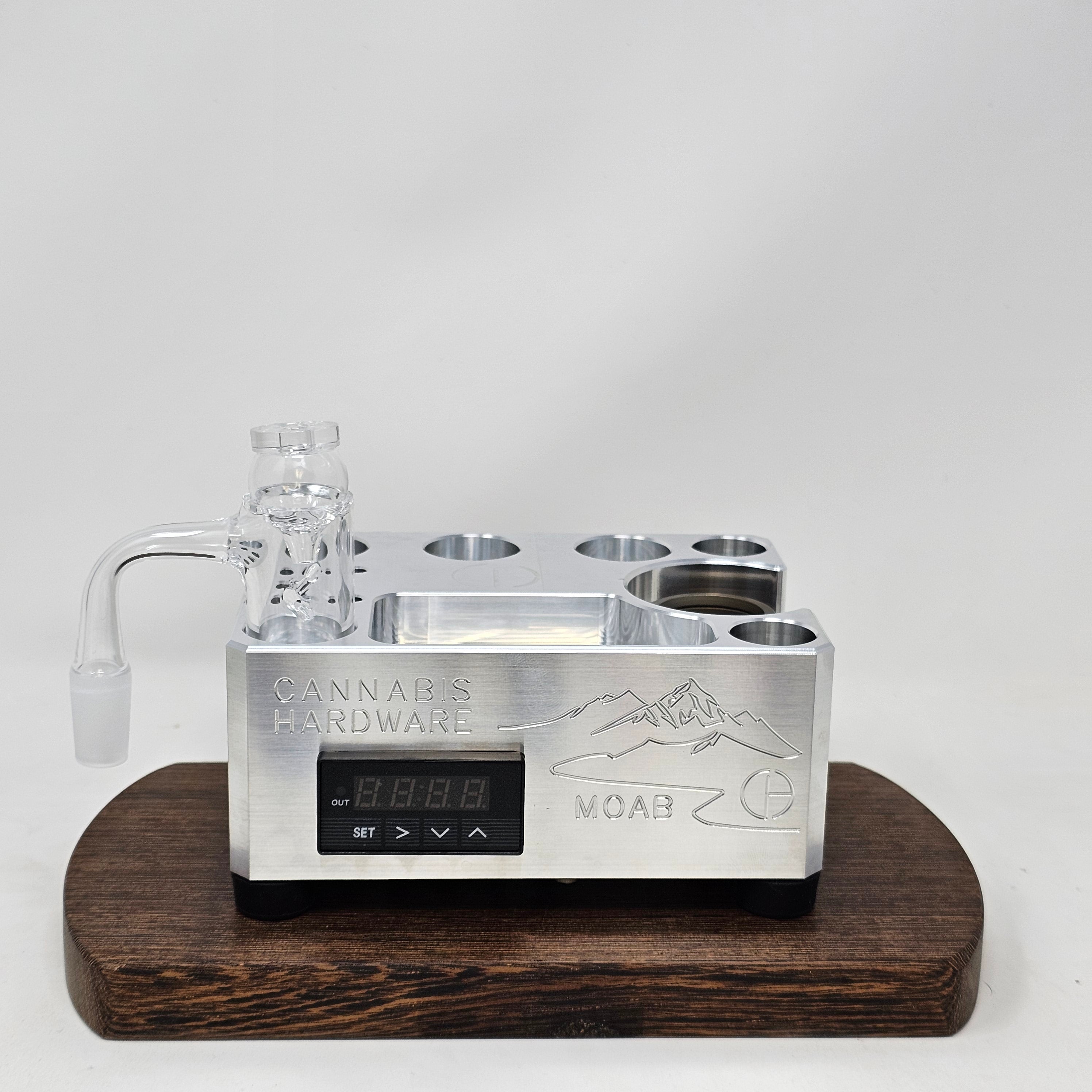 Introducing Moab, the first cordless cannabis vaporizer base station by Cannabis Hardware. The Moab is a more streamlined version of the Nova. We have made this a more affordable unit by de-featuring some of the adjustability and looks of the Nova but added utility.

The Moab is the first in the Zenleaf lineup to use the billet as a heat shield by building it into the body itself.