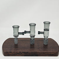 Now in smoked glass!

Made specifically for 19mm input injector style vapes!  These V2 Injector Chambers (Rod instead of tab handle + glass and screen deck options) work with all injector style ball units on the market including the DC Elev8R, TiTi, Pinky, B0, B1, B2, F16, Lethal Injector, Hot Rod, Terp Torch, Freight Train, Qaromashop (some have reported fitment issues with the Taroma lite but the others seem to work) and others.