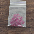 These 4mm Ruby (Lab created) beads / balls / spheres have a number of different purposes being used in both heat sink vaporizer tech as well as glass mouthpiece cooling tech.

Pouch is filled with ~10g of beads or more. 60-70 4mm Ruby beads.